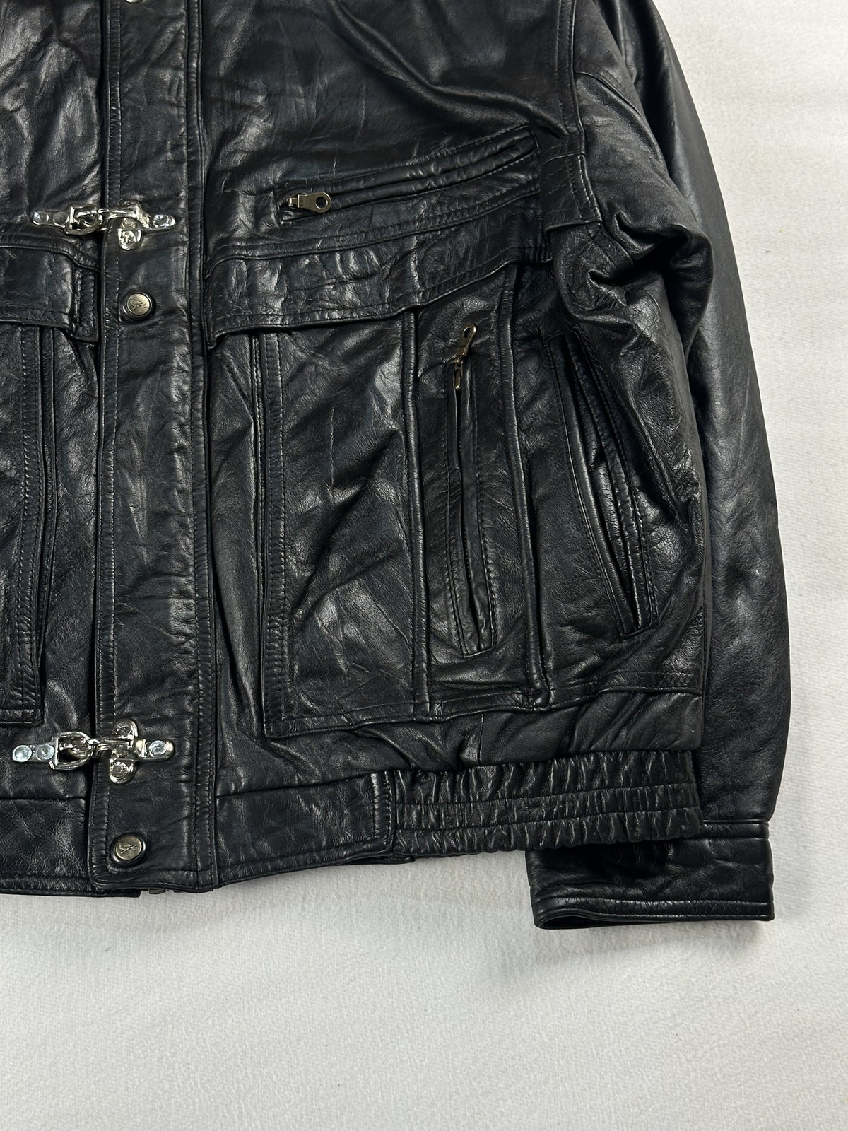 Black leather vintage jacket, size L - size and label context.