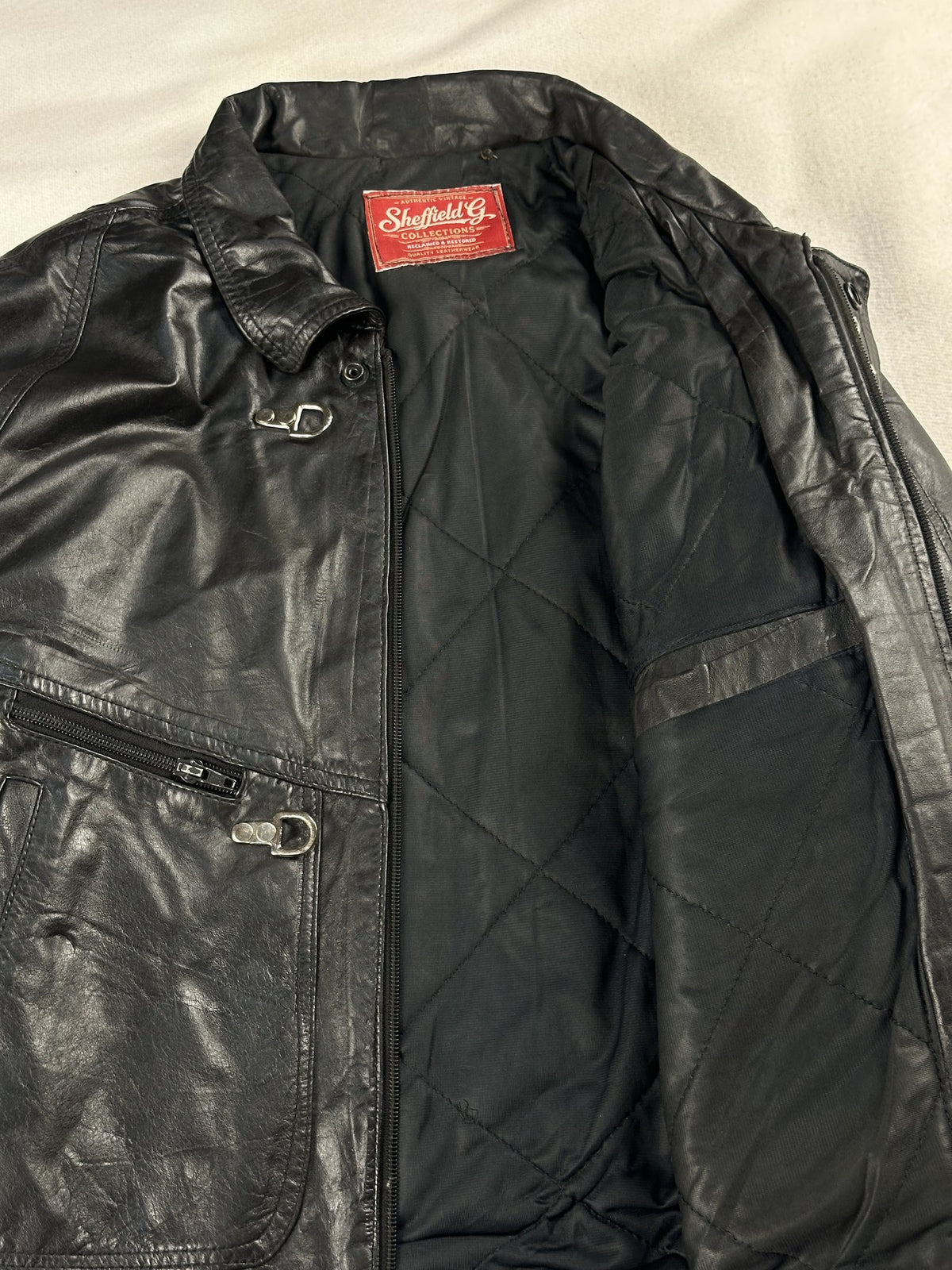 Black leather vintage jacket, size M - back view.