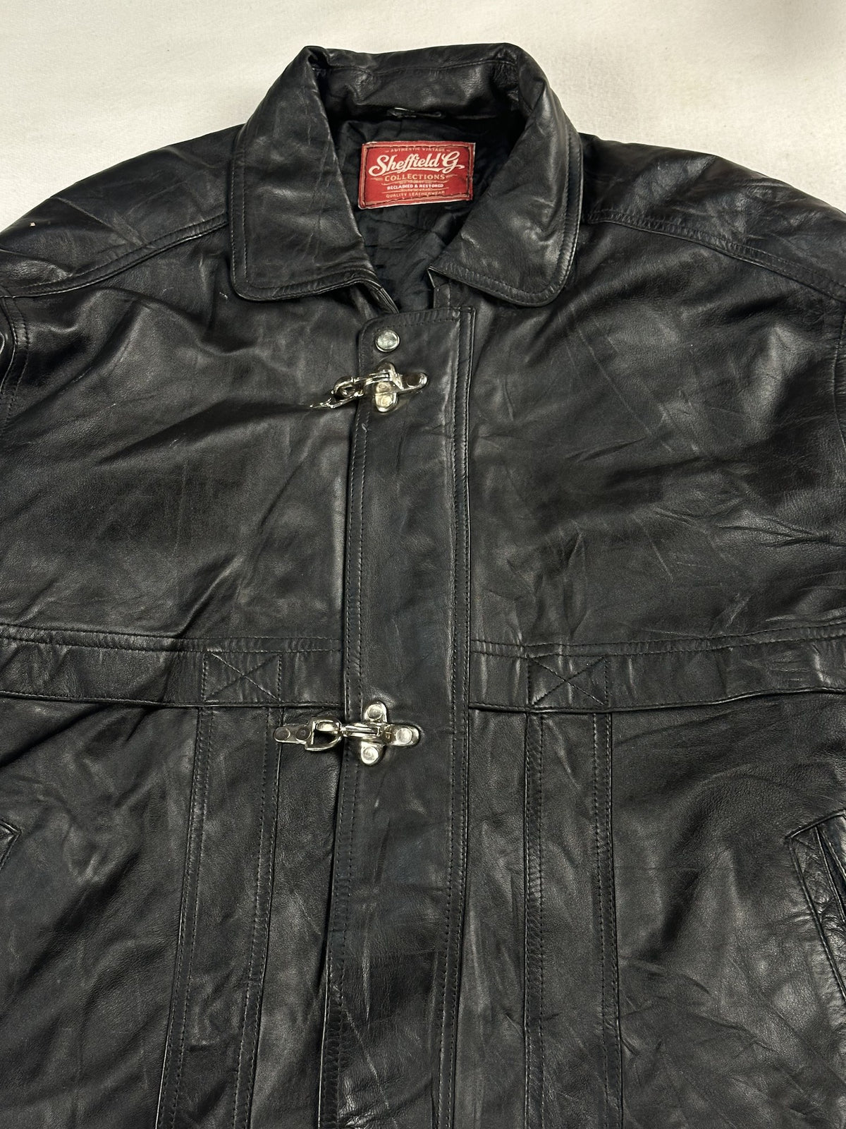 Black leather vintage jacket, size L - back view.
