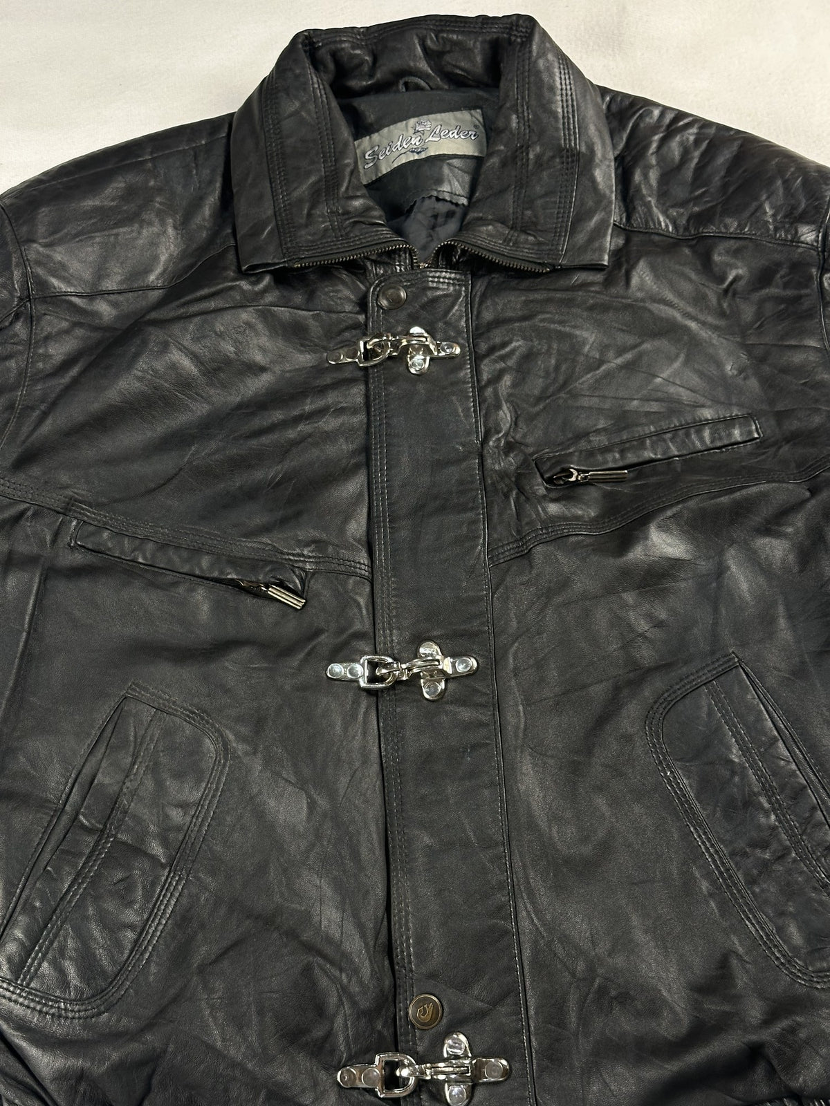 Black leather vintage jacket, size L - back view.