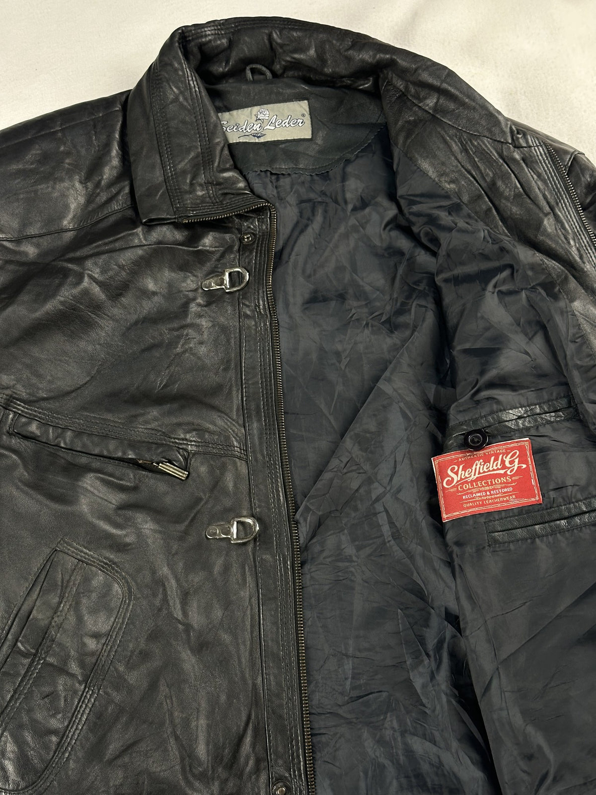 Black leather vintage jacket, size L - interior lining.