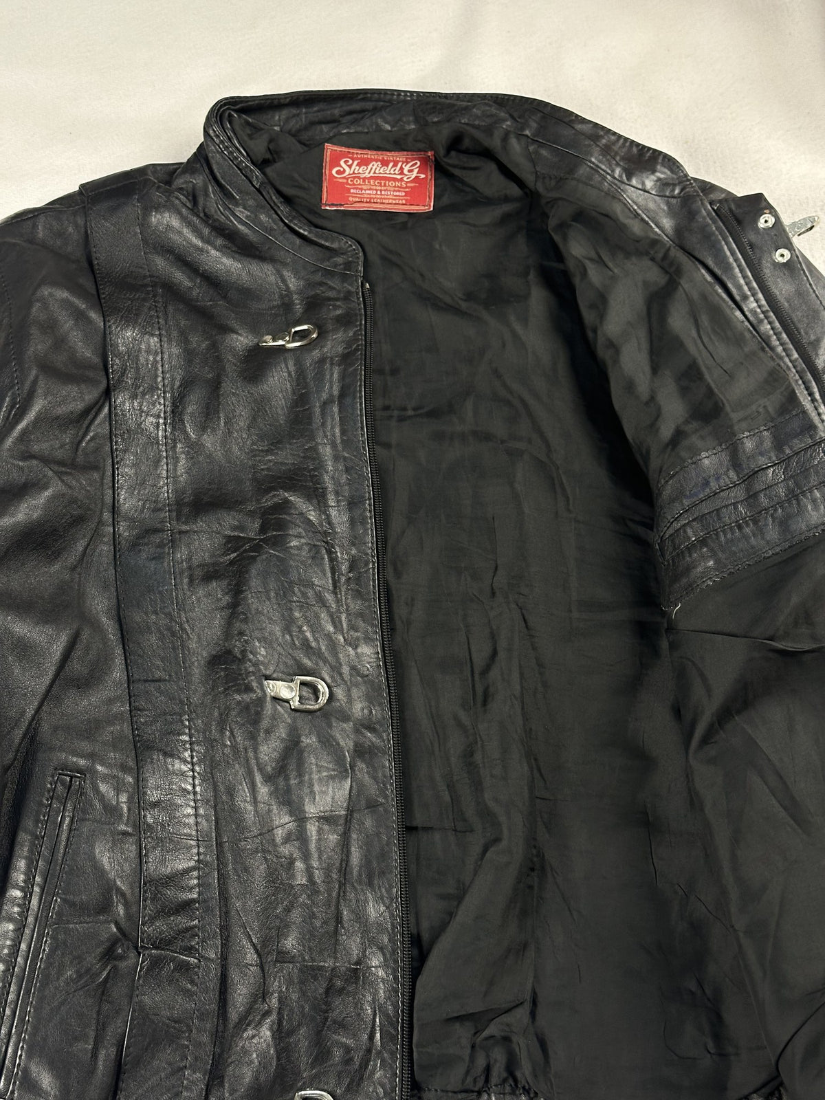 Black leather cafe racer jacket, size L - interior lining.