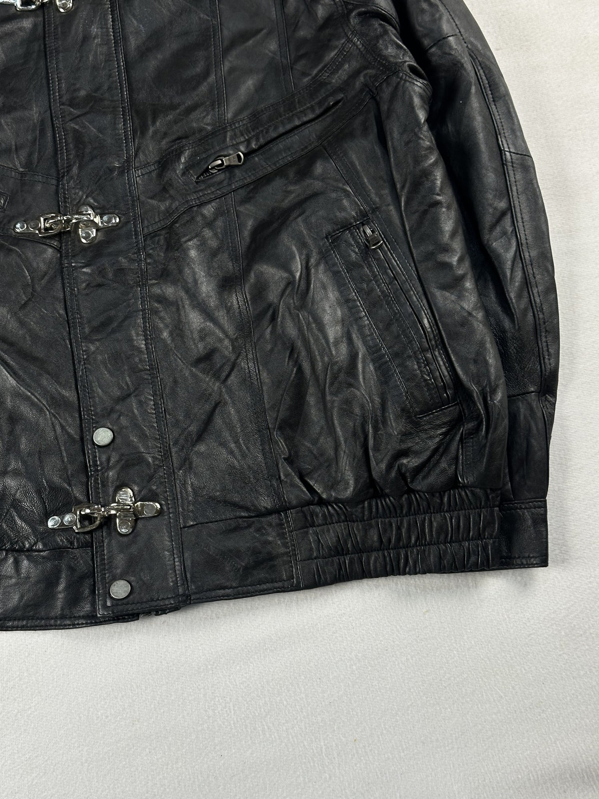 Black leather vintage jacket, size L - size and label context.