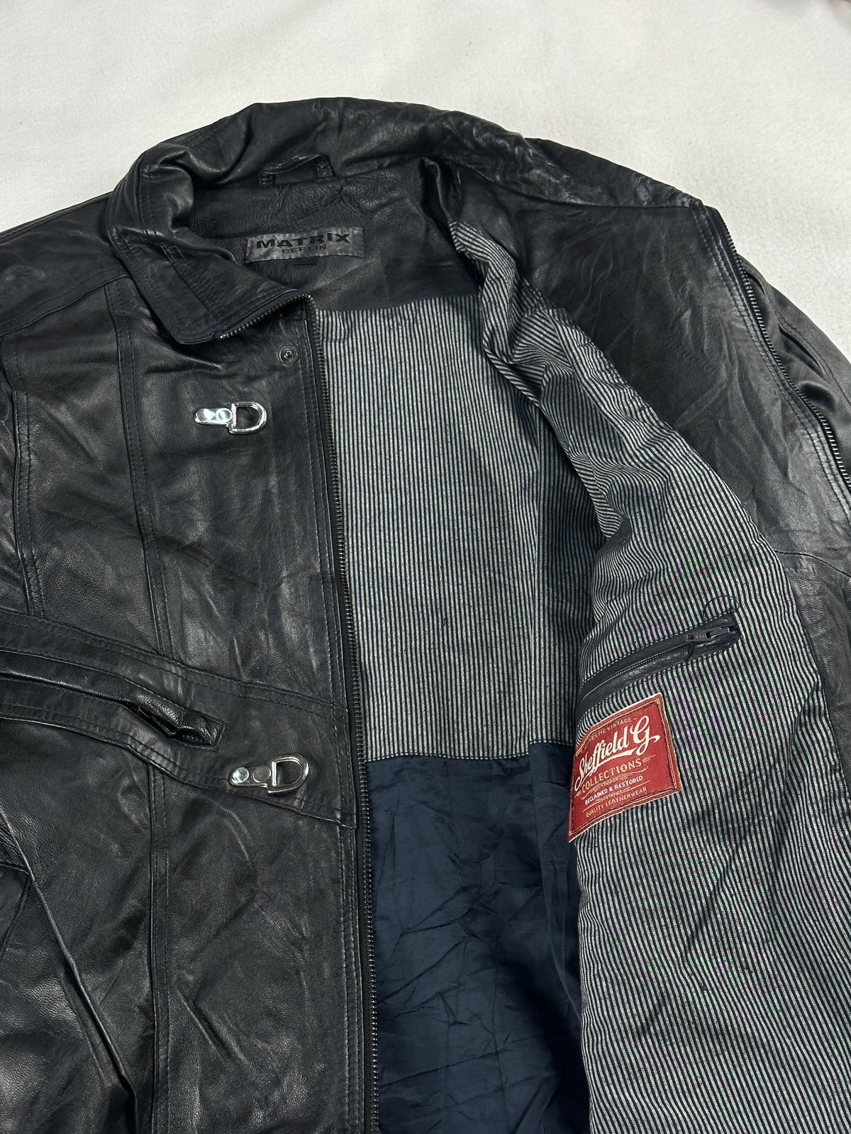 Black leather vintage jacket, size L - cuff and hem detail.
