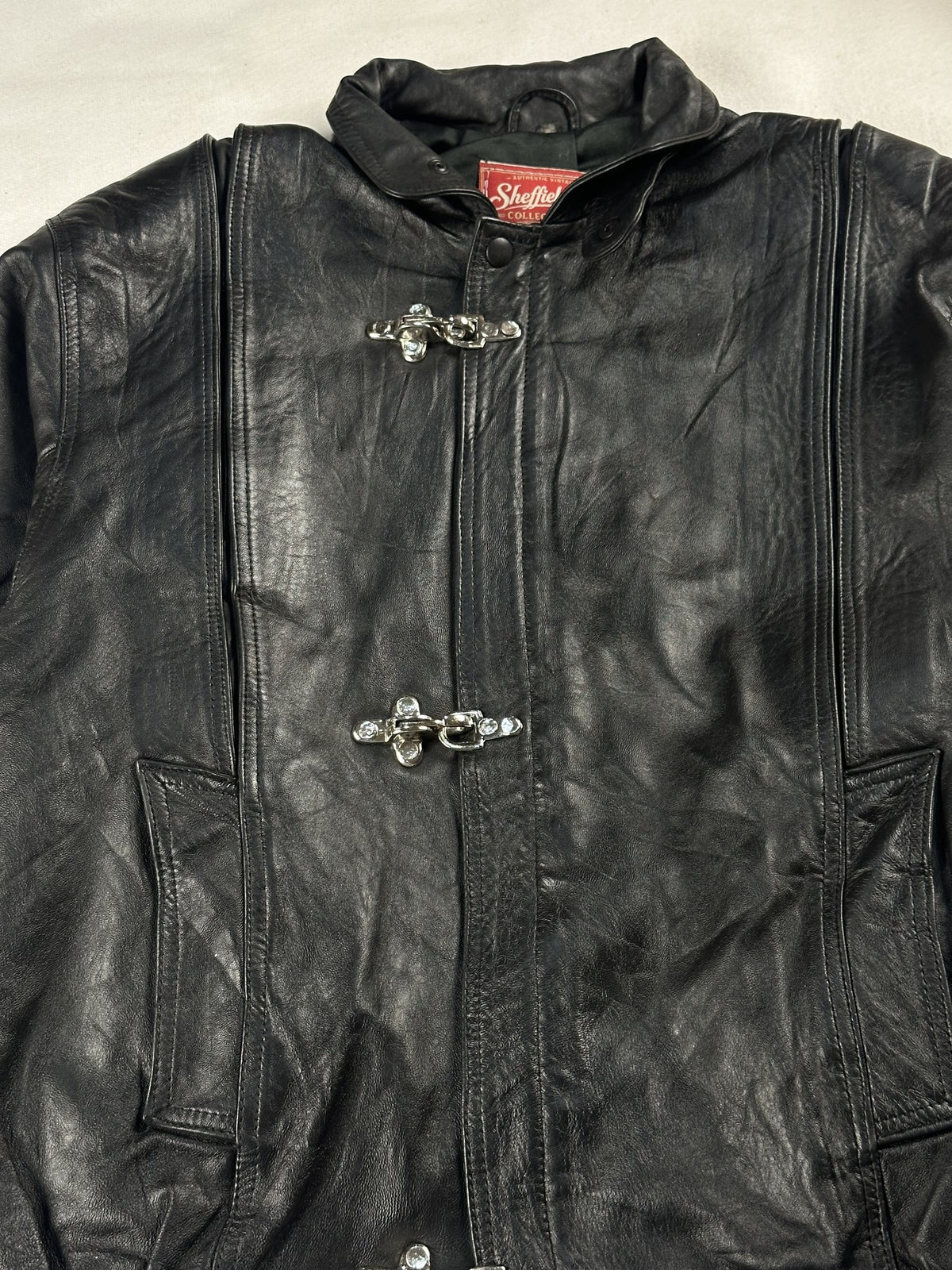 Black leather vintage jacket, size L - back view.