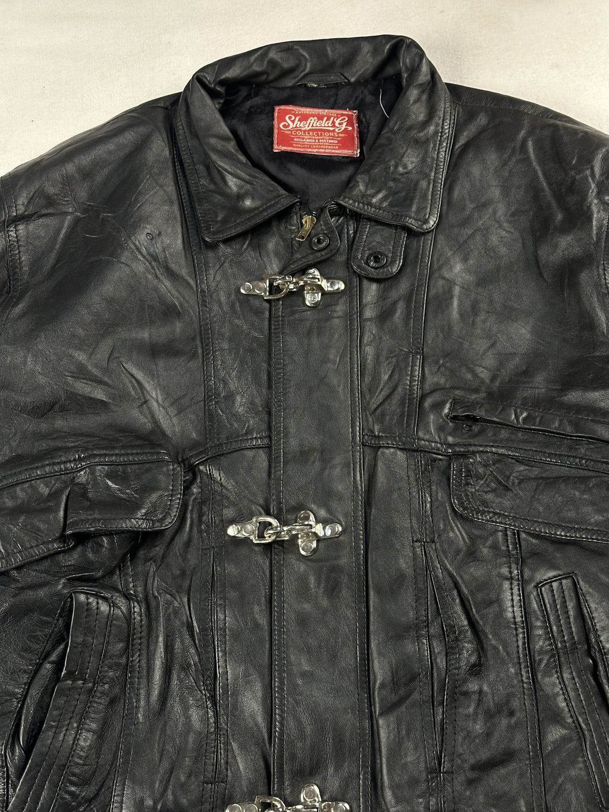 Black leather vintage jacket, size L - back view.