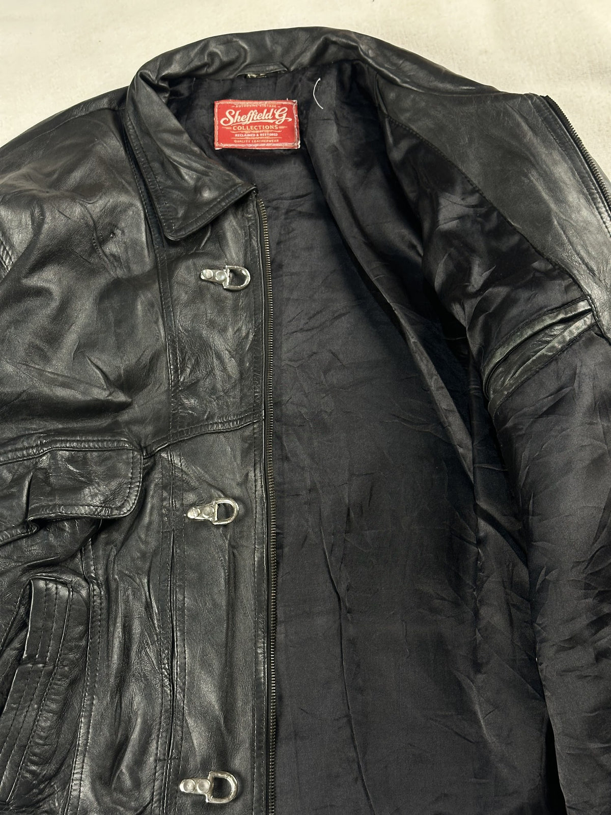 Black leather vintage jacket, size L - interior lining.