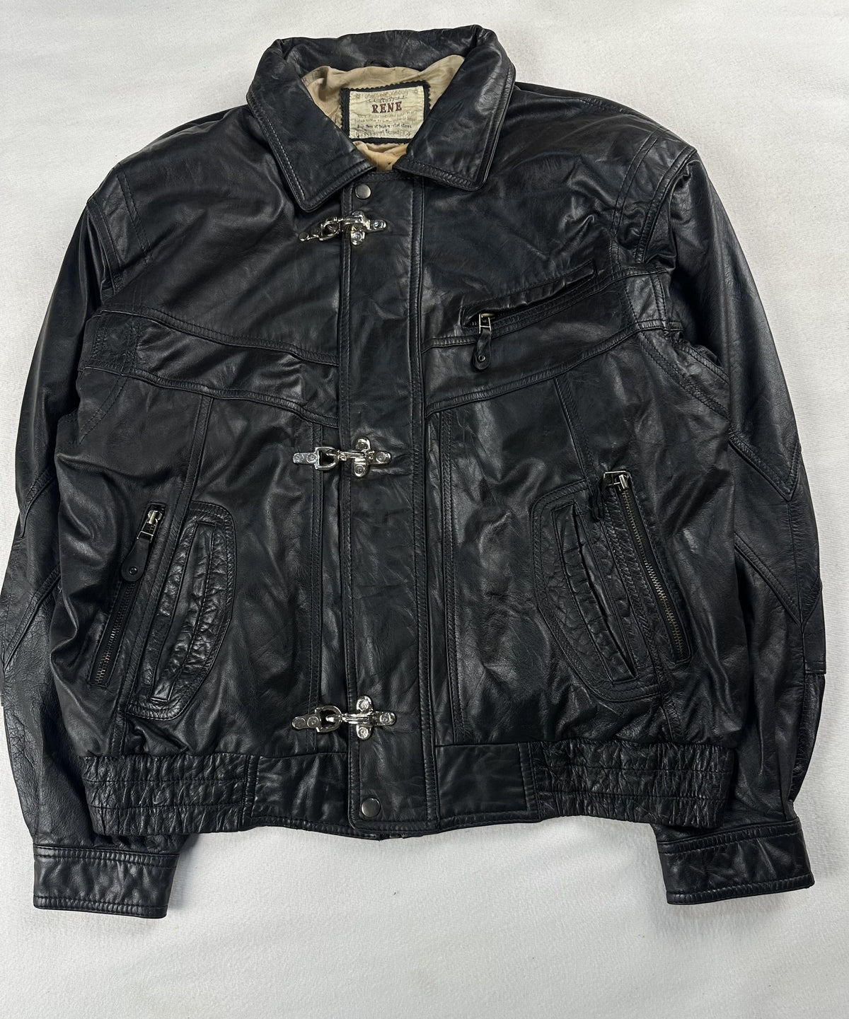 Black leather vintage jacket, size L - chest and pocket detail.