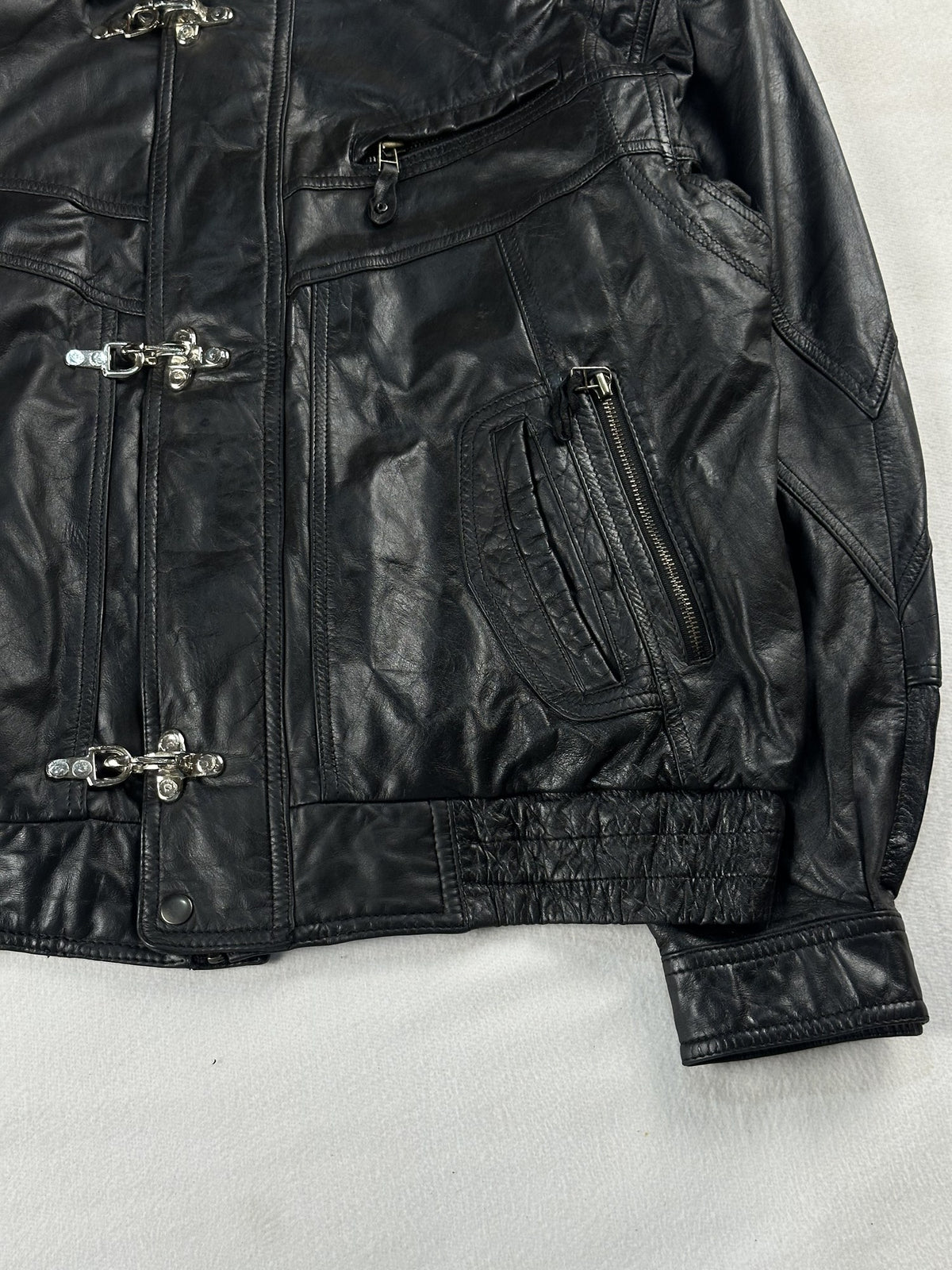 Black leather vintage jacket, size L - size and label context.
