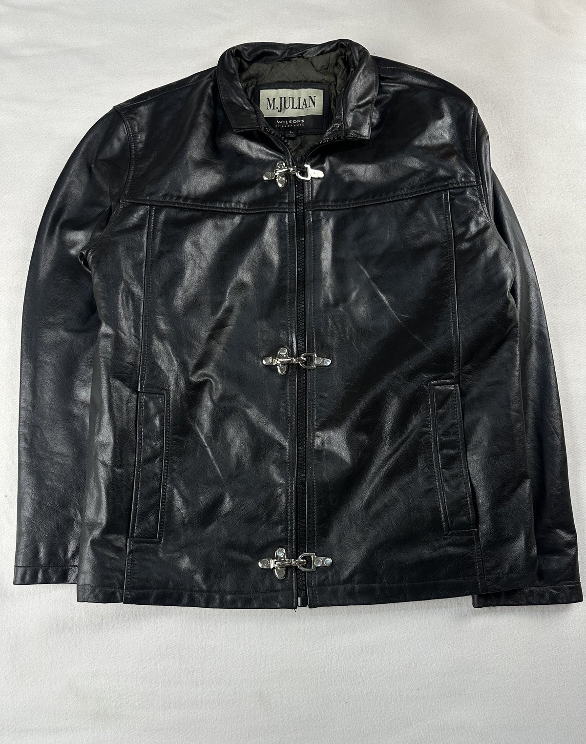 Black leather cafe racer jacket, size M - chest and pocket detail.