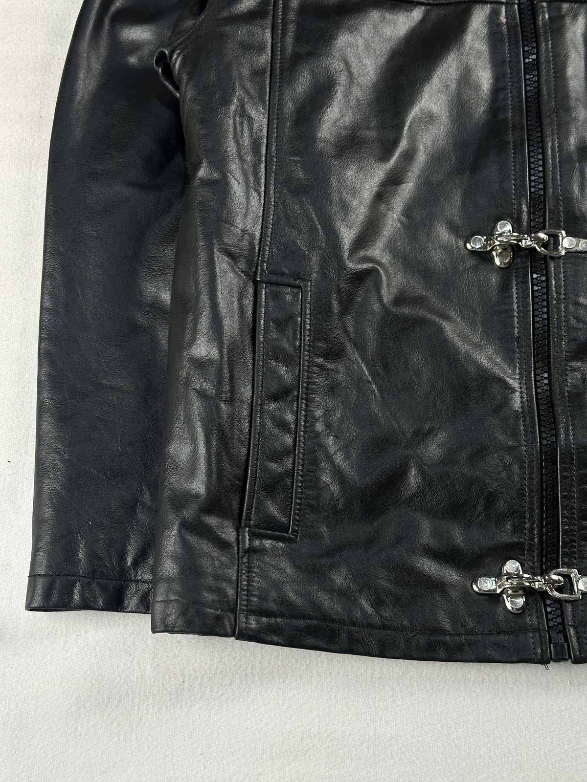 Black leather cafe racer jacket, size M - sleeve and cuff.
