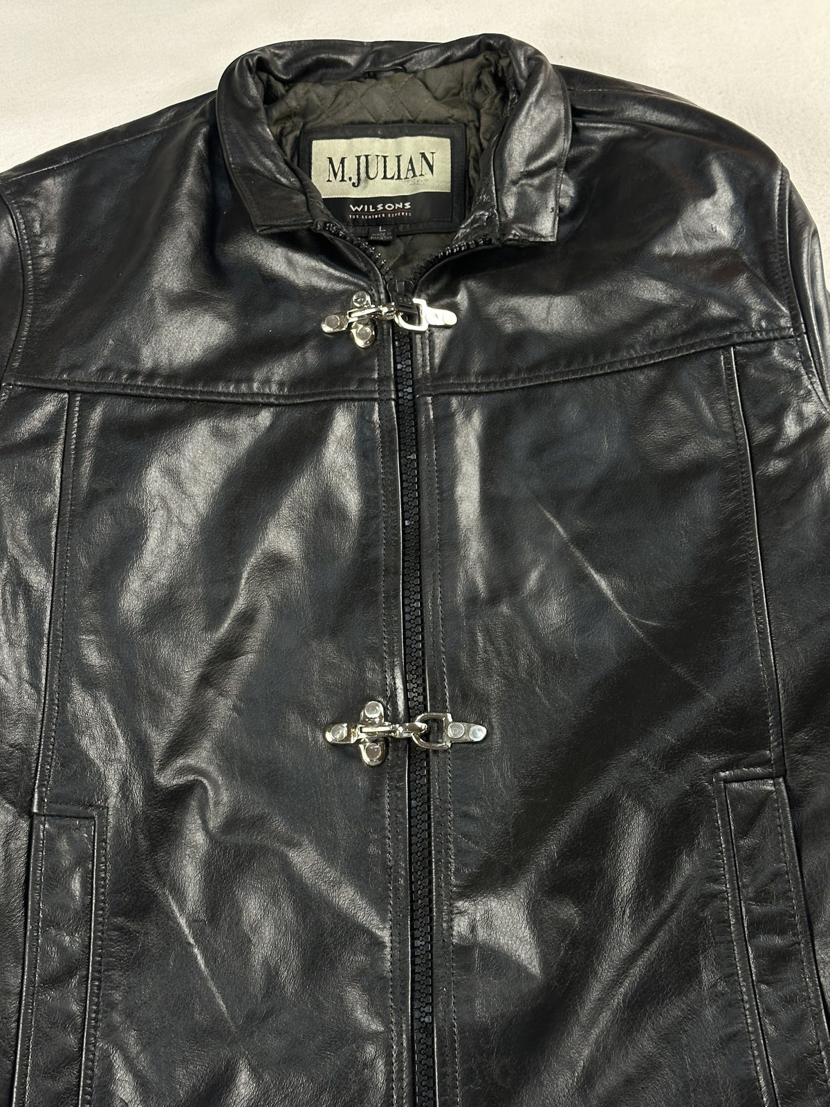Black leather cafe racer jacket, size M - back view.