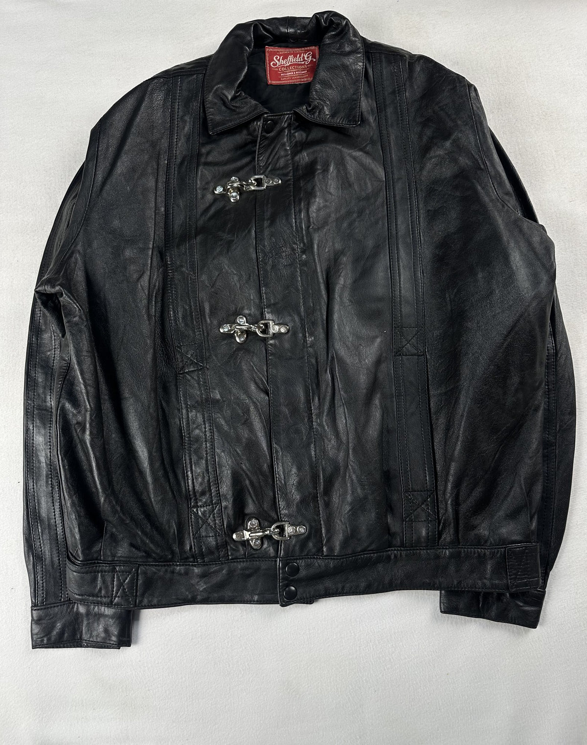 Black leather vintage jacket, size L - chest and pocket detail.