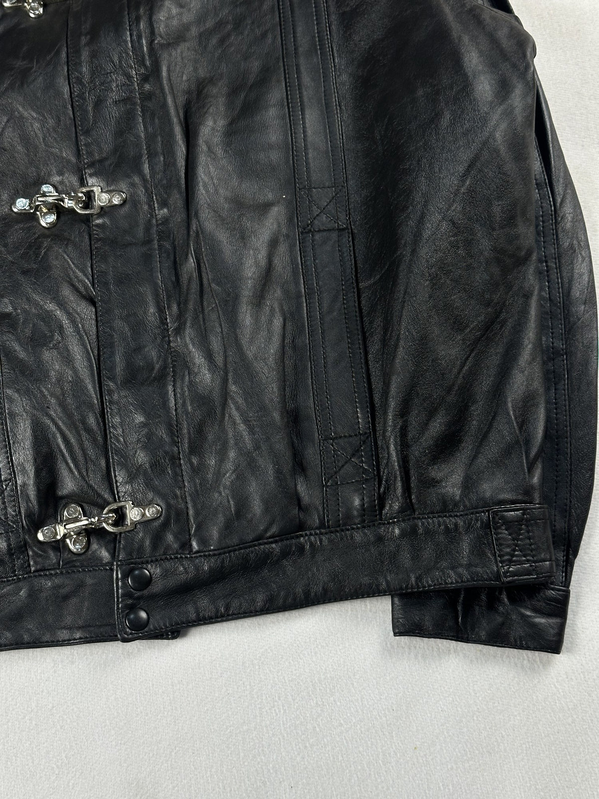 Black leather vintage jacket, size L - size and label context.