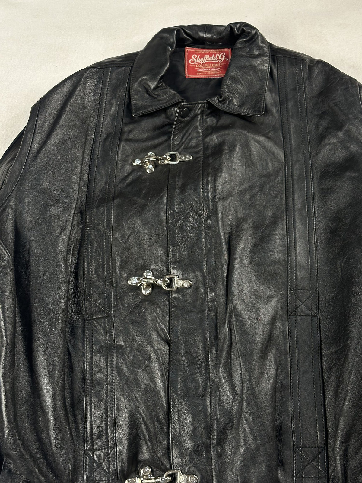 Black leather vintage jacket, size L - back view.
