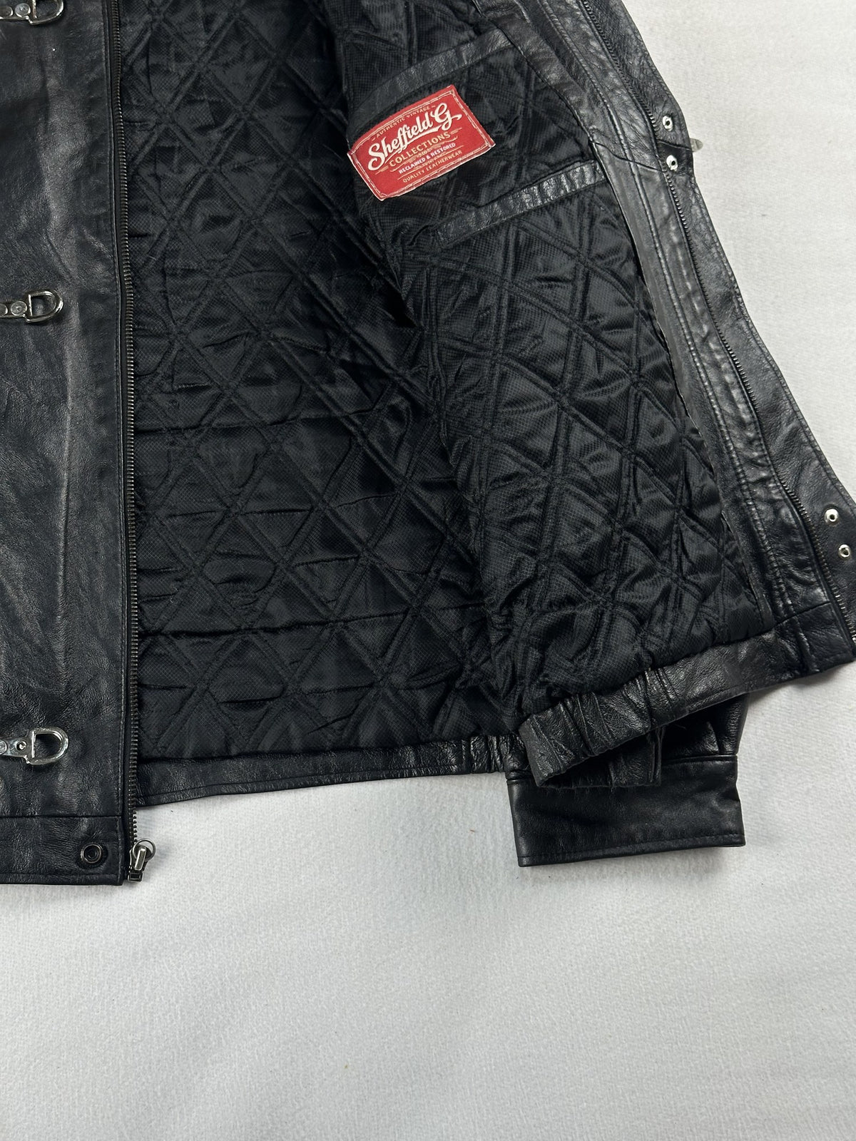 Black leather vintage jacket, size L - interior lining.