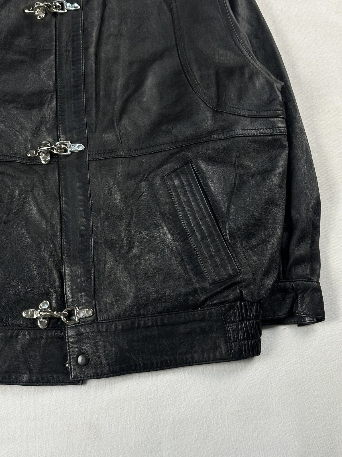 Black leather vintage jacket, size M - size and label context.