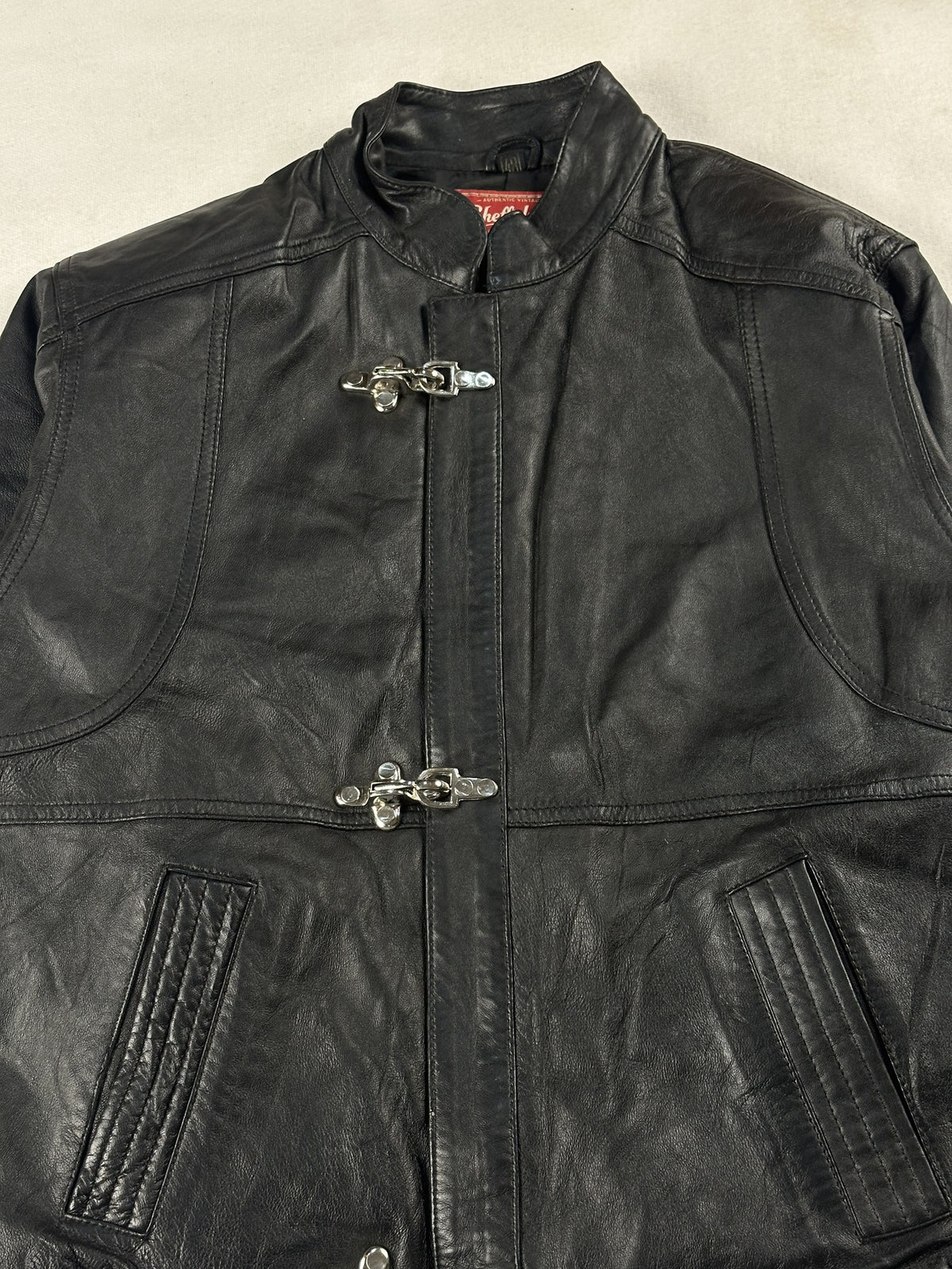 Black leather vintage jacket, size M - back view.