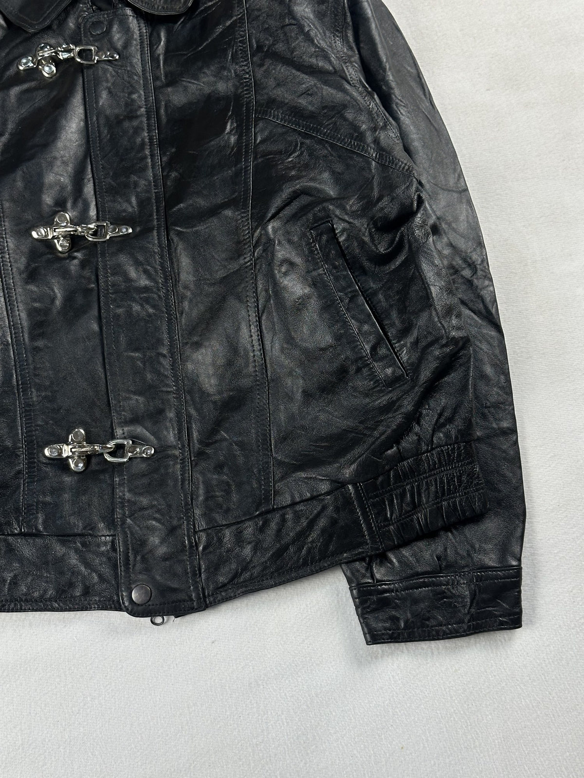 Black leather vintage jacket, size M - size and label context.