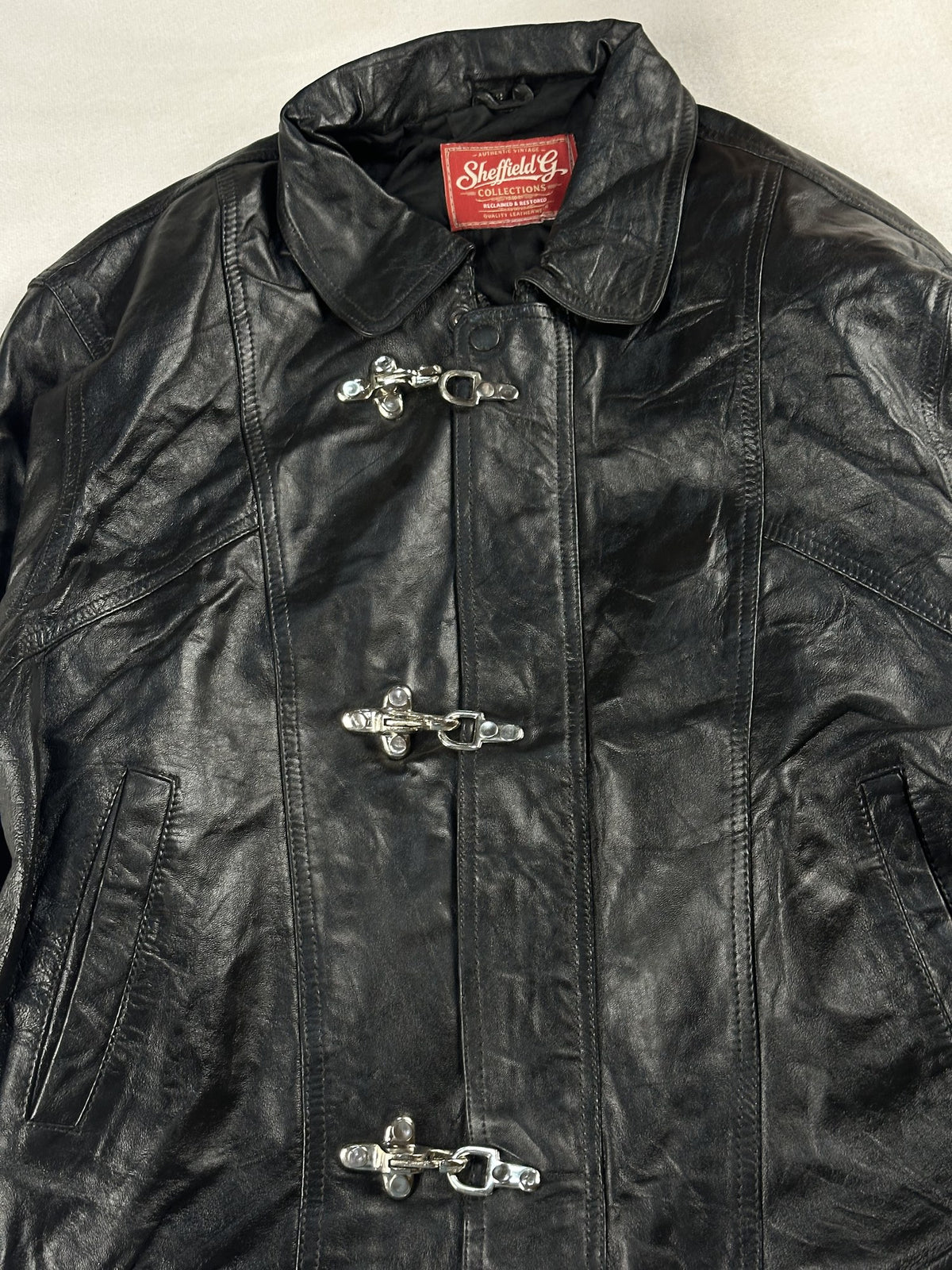 Black leather vintage jacket, size M - back view.