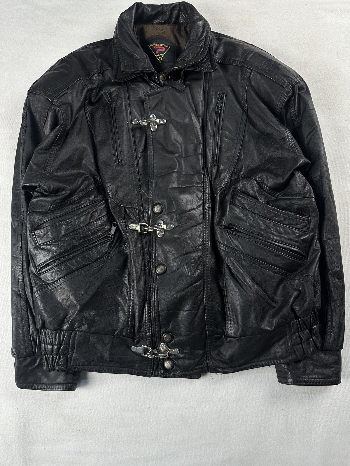 Black leather field jacket, size L - chest and pocket detail.