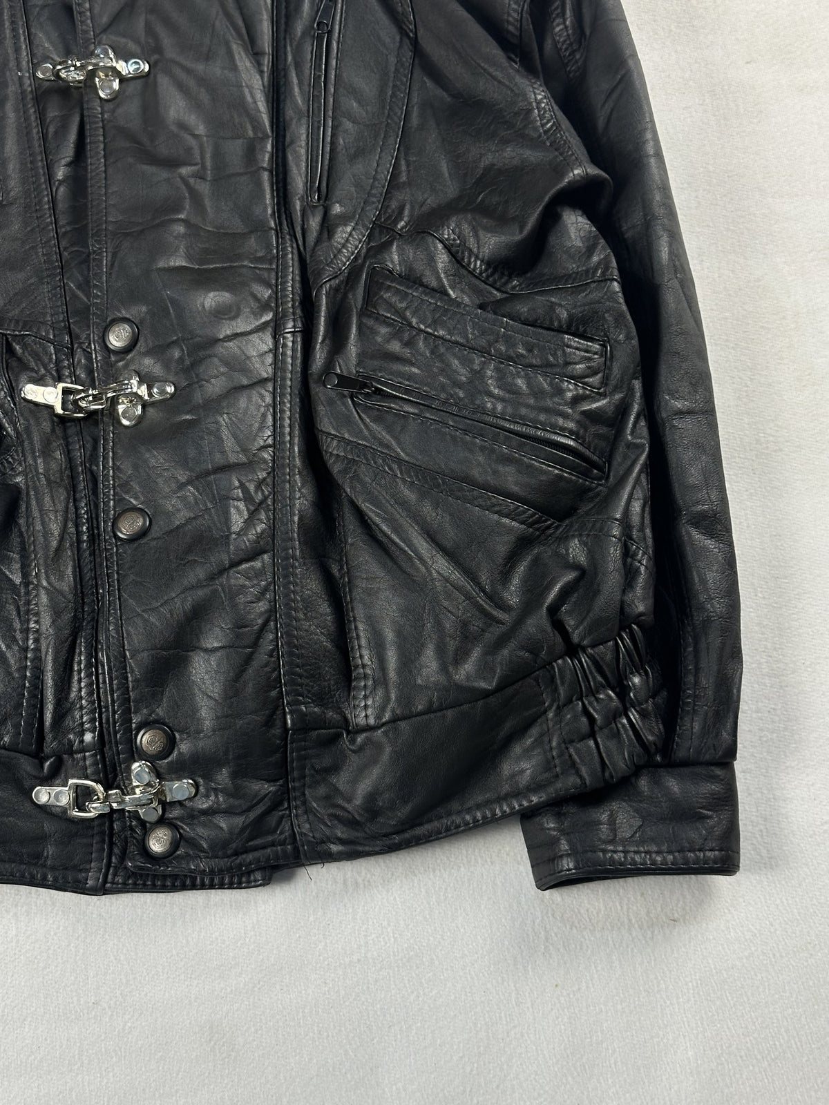 Black leather field jacket, size L - size and label context.