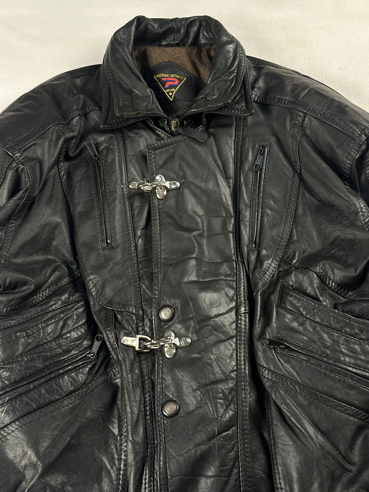 Black leather field jacket, size L - back view.
