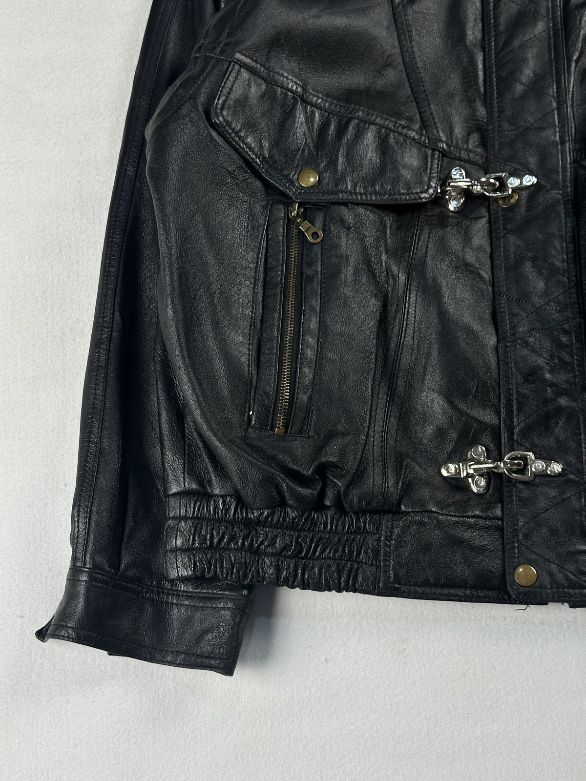 Black leather field jacket, size M - chest and pocket detail.