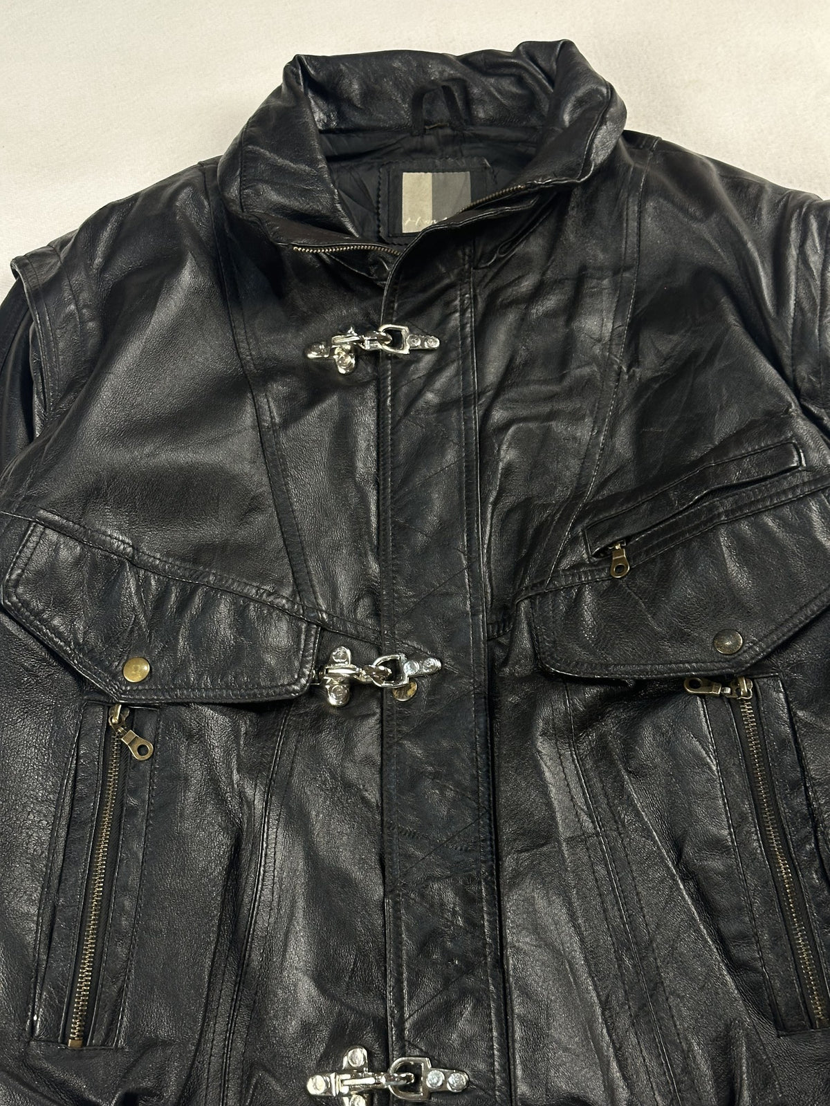 Black leather field jacket, size M - size and label context.