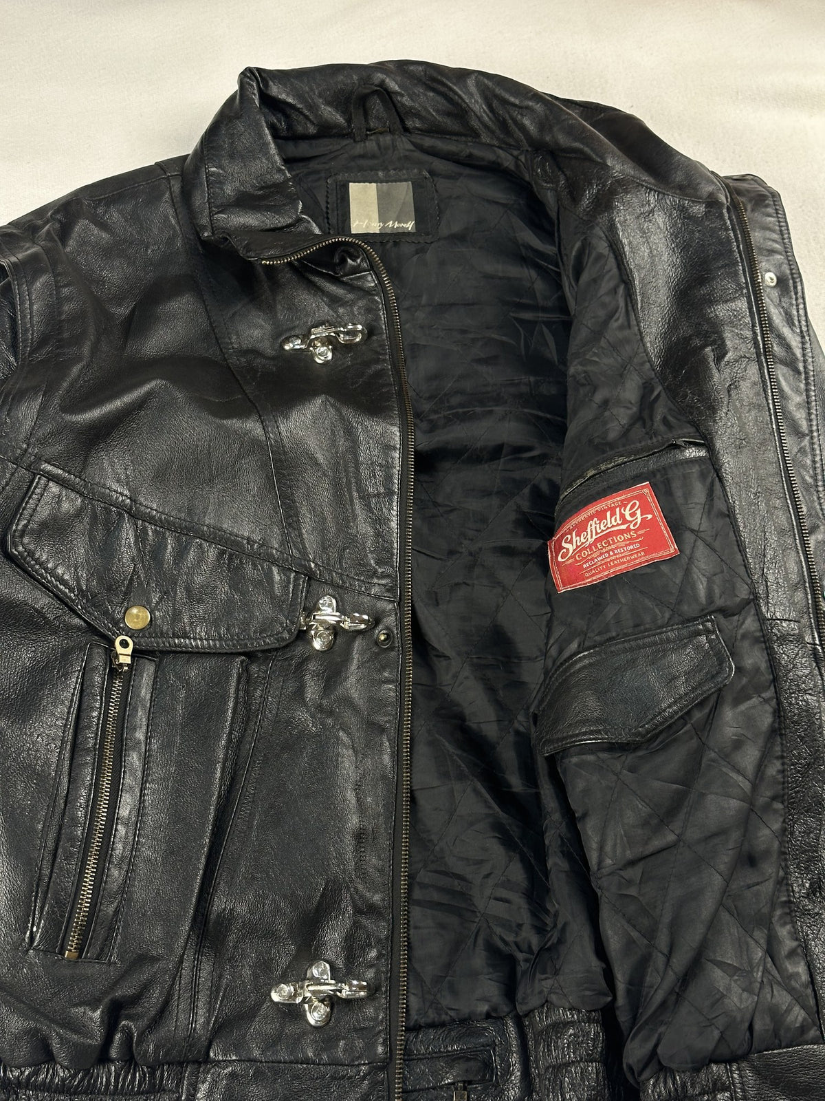 Black leather field jacket, size M - interior lining.