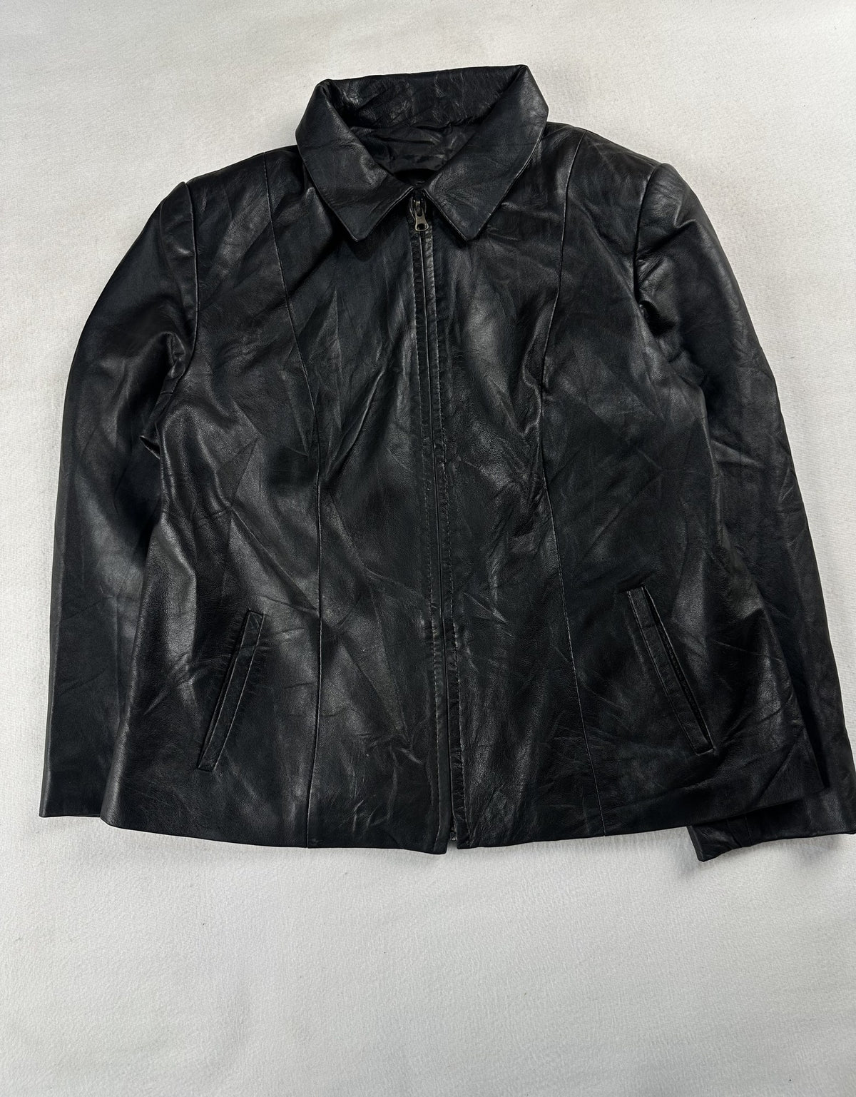 Black leather vintage jacket, size XS - chest and pocket detail.
