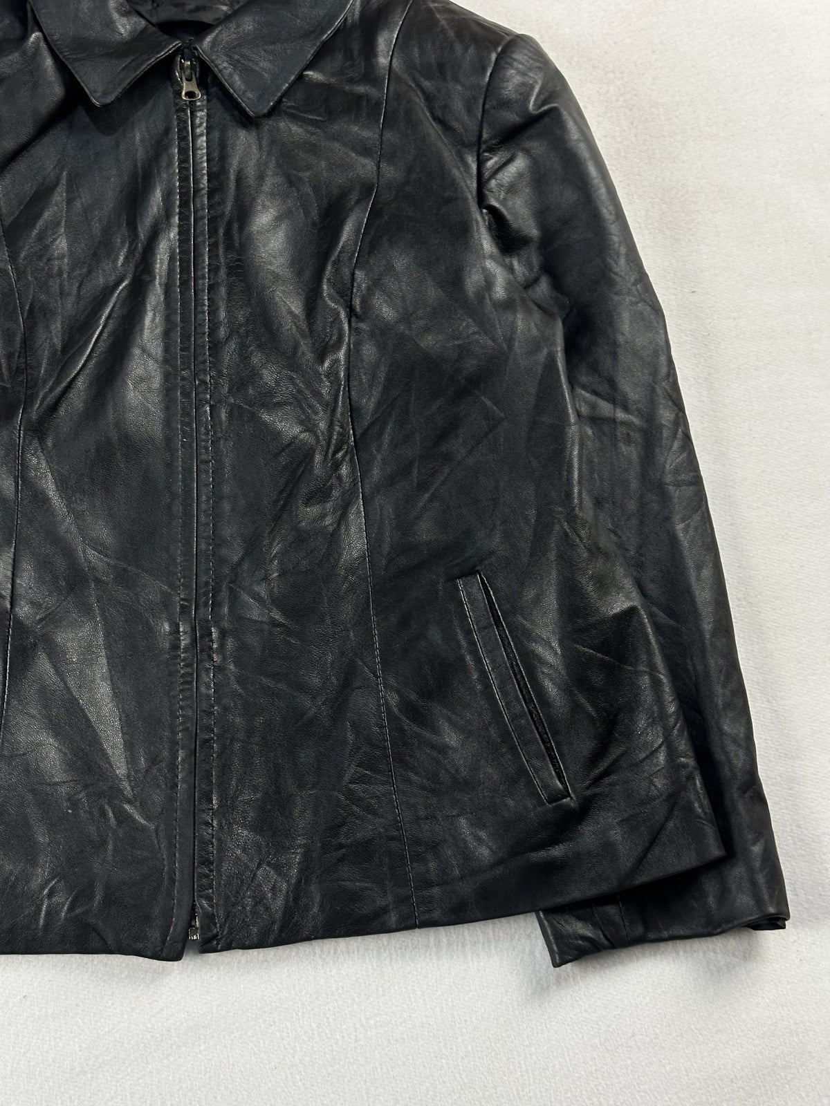 Black leather vintage jacket, size XS - size and label context.