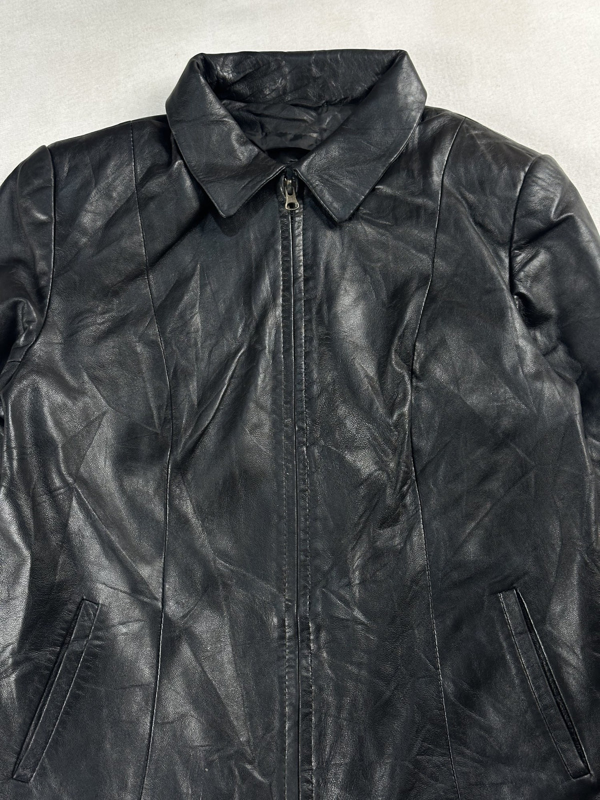 Black leather vintage jacket, size XS - back view.