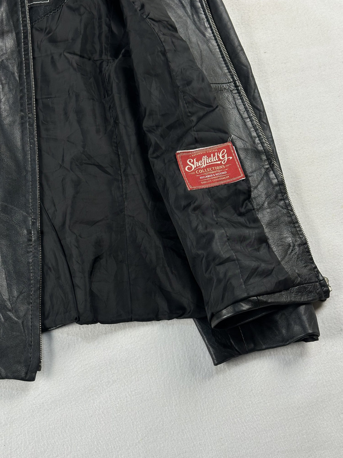 Black leather vintage jacket, size XS - interior lining.