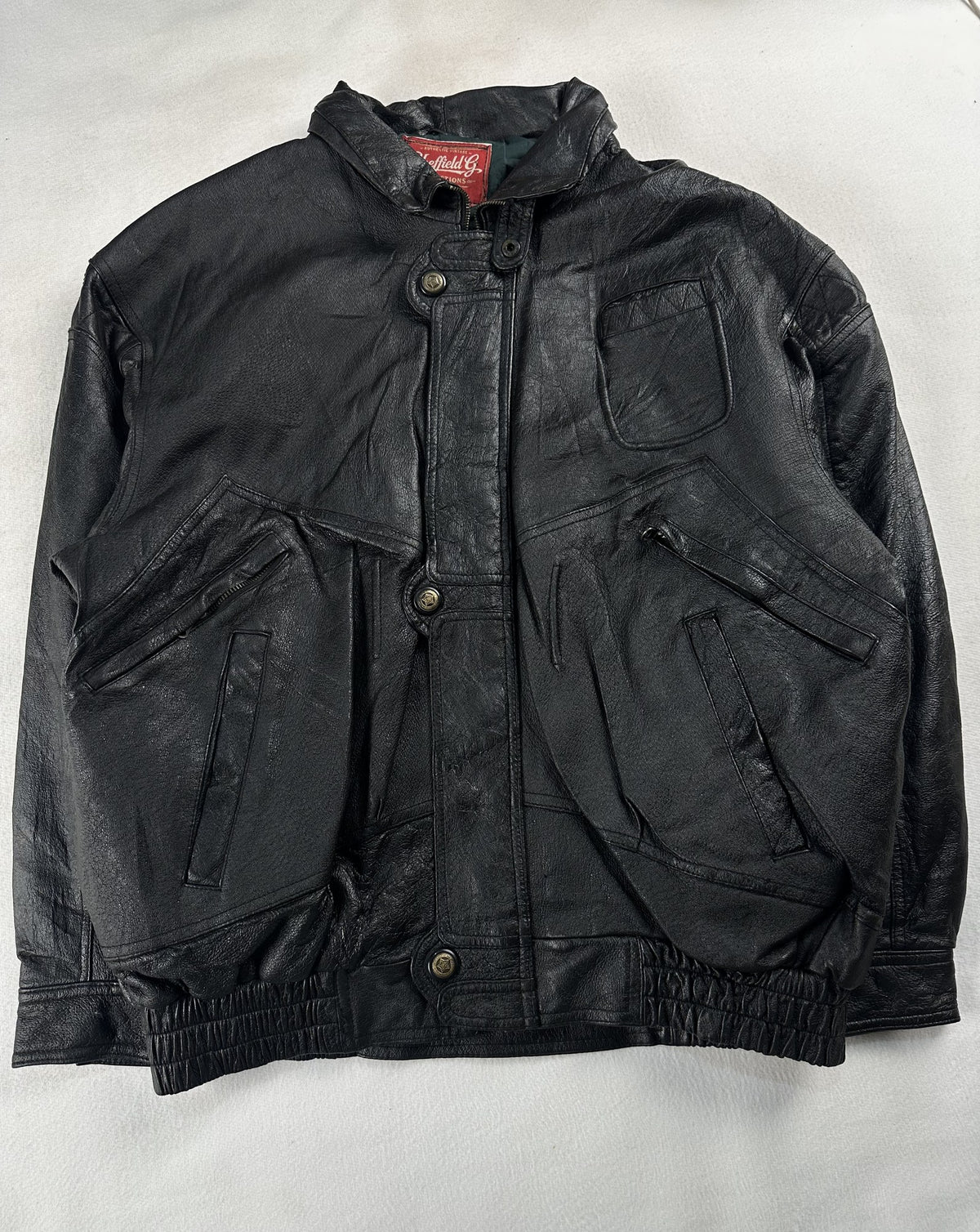Black leather field jacket, size L - chest and pocket detail.