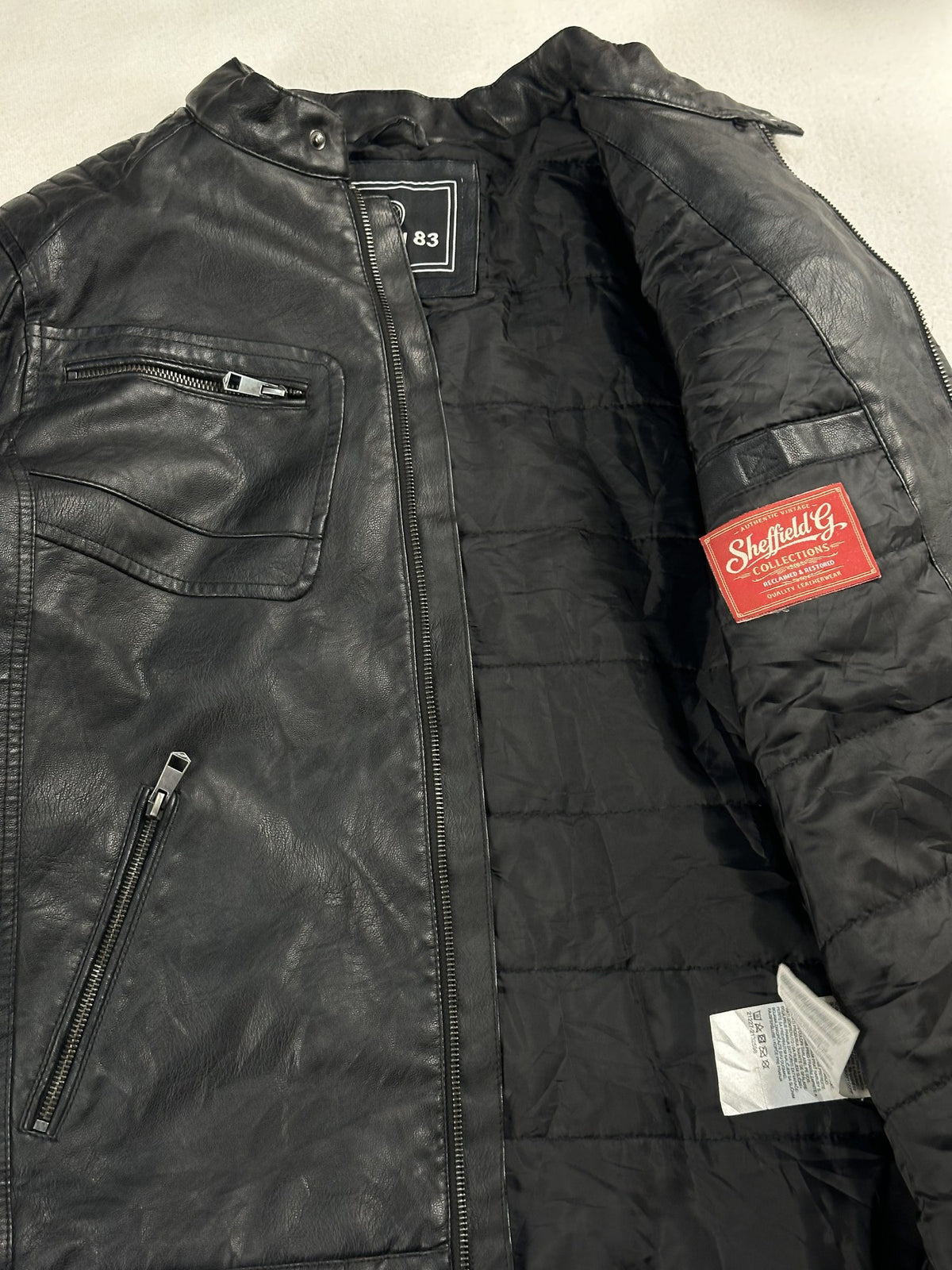 Black leather cafe racer jacket, size M - interior lining.