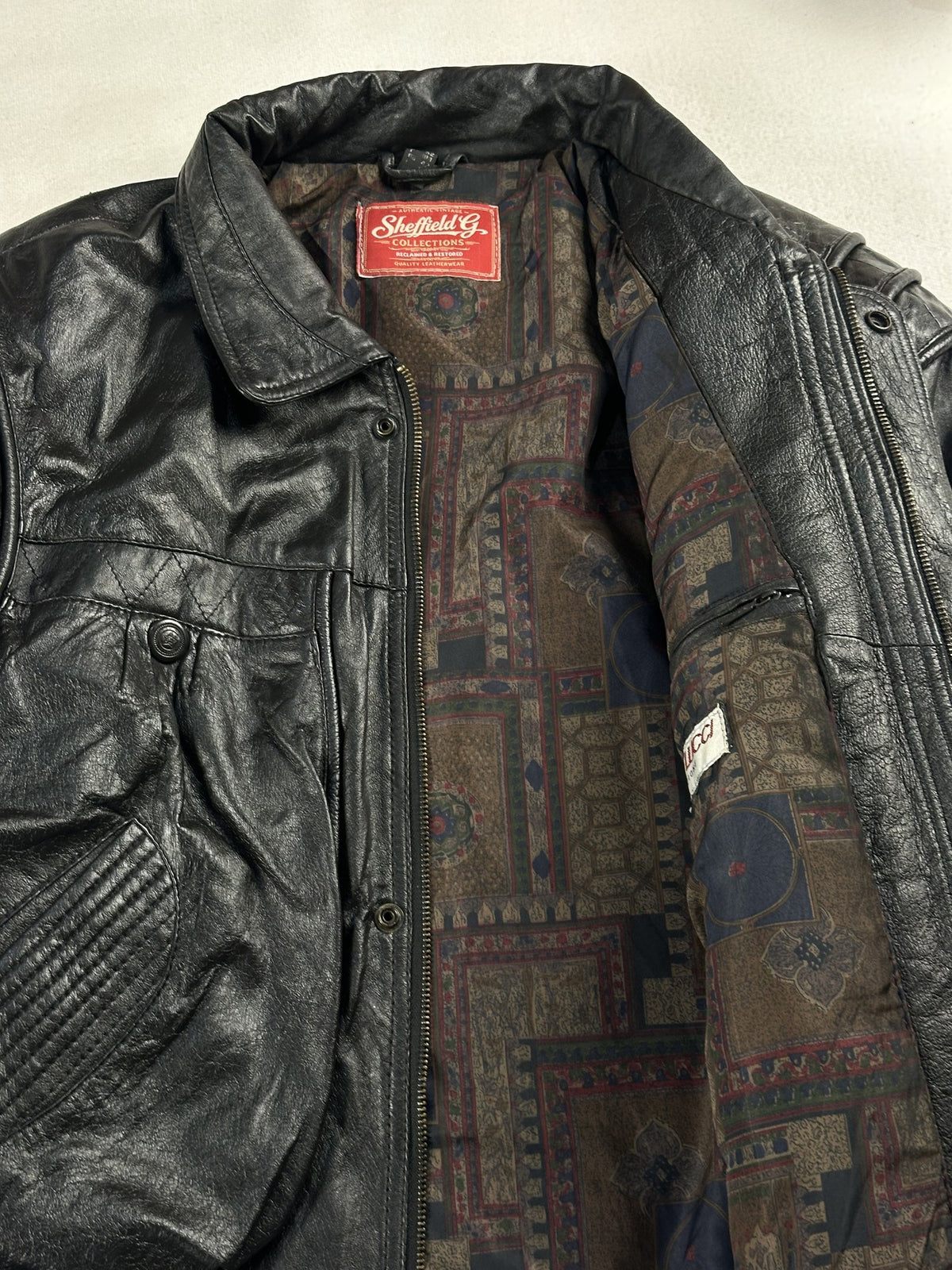 Black leather field jacket, size M - interior lining.