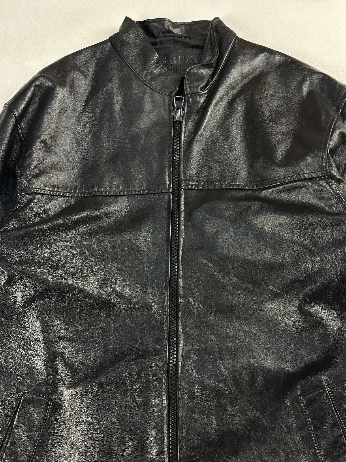 Black leather vintage jacket, size L - back view.