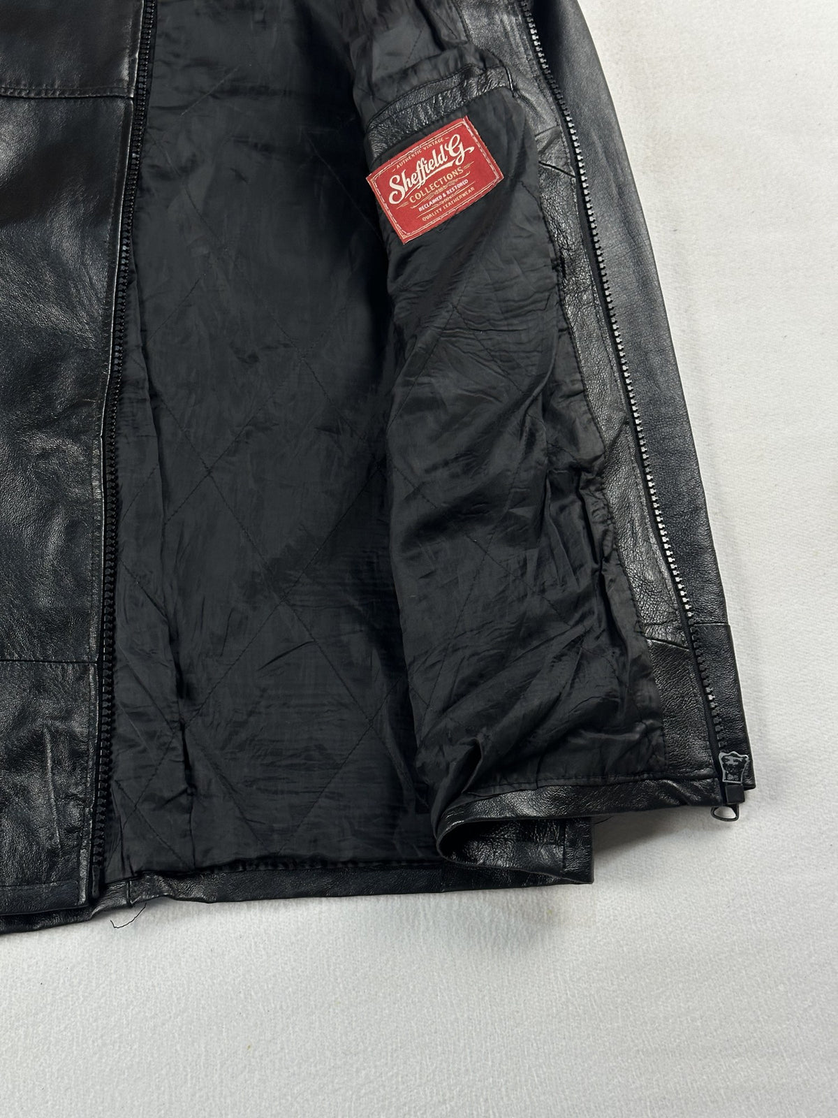 Black leather vintage jacket, size L - interior lining.