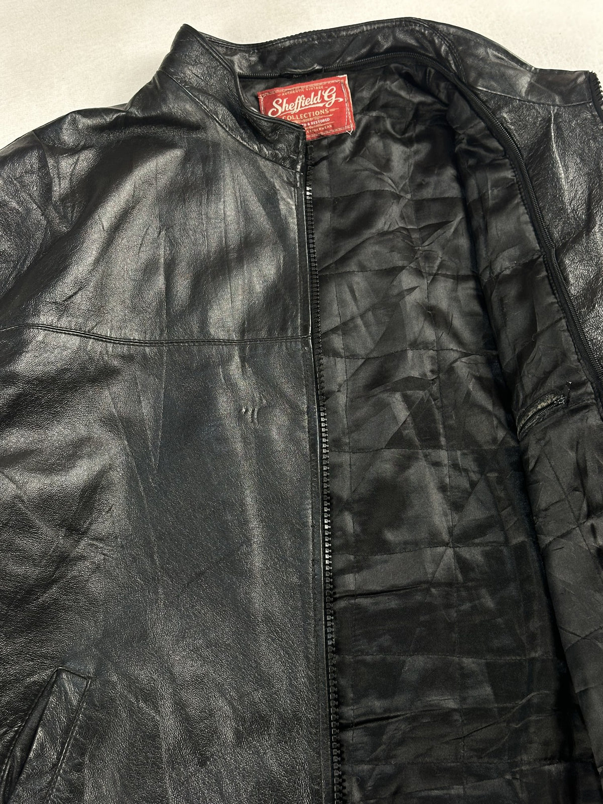Black leather vintage jacket, size L - interior lining.