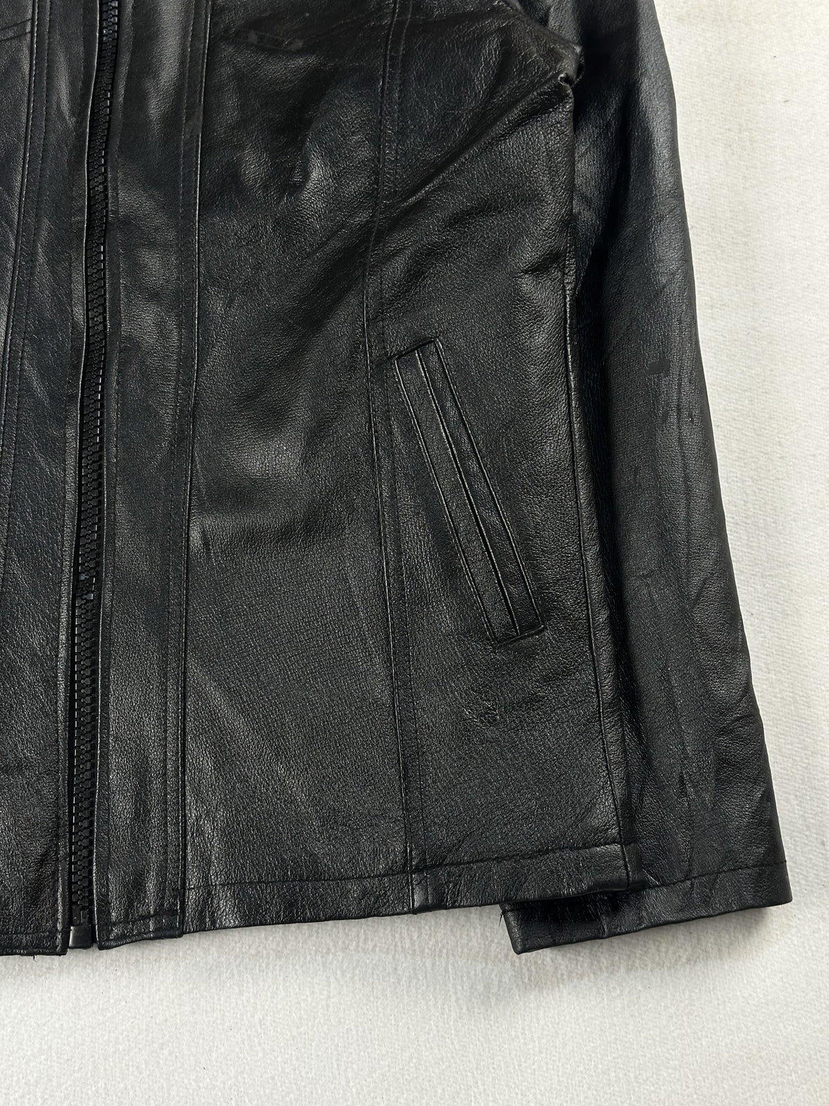 Black leather vintage jacket, size M - size and label context.