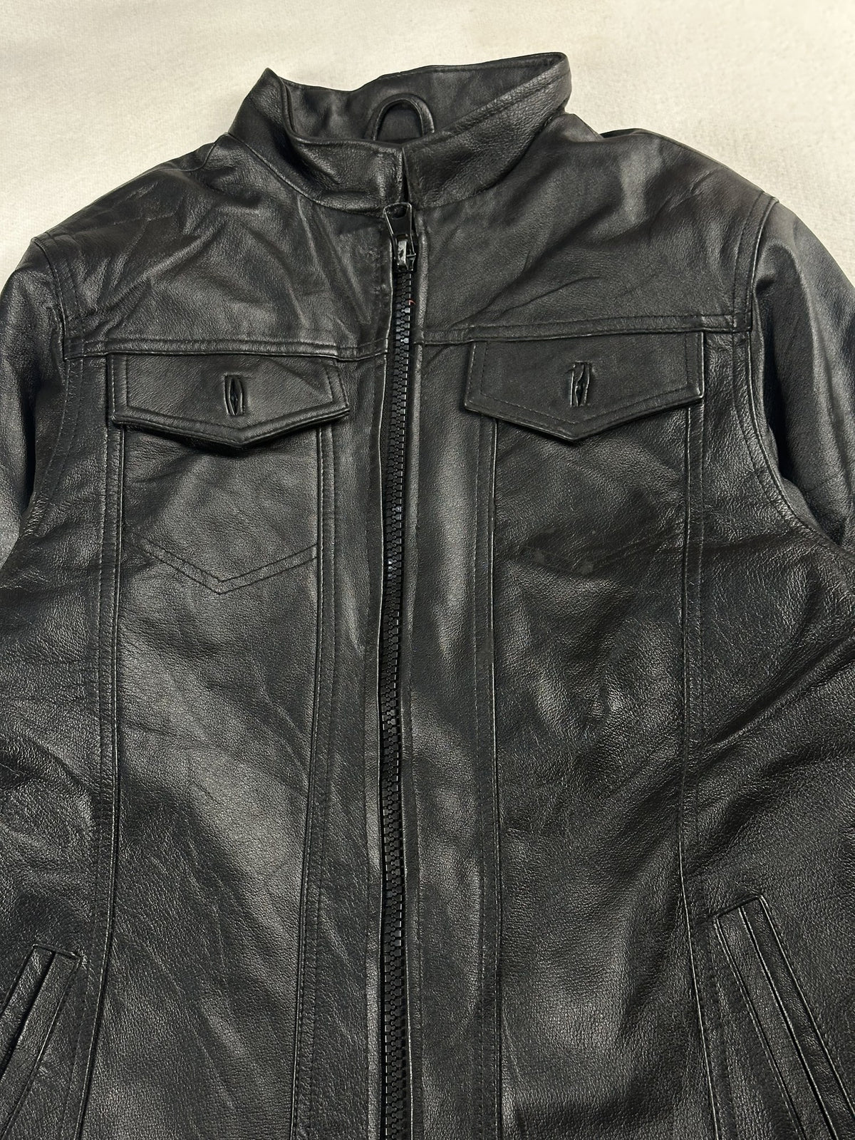 Black leather vintage jacket, size M - back view.