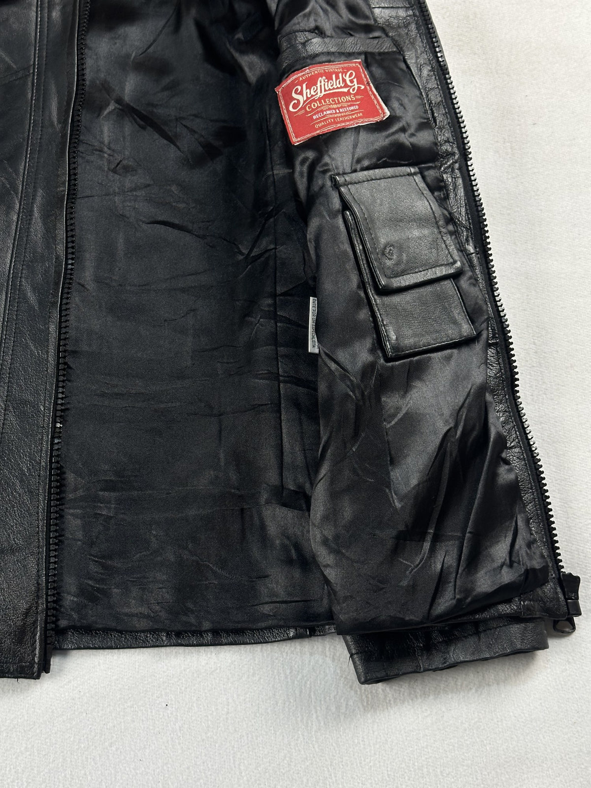 Black leather vintage jacket, size M - interior lining.