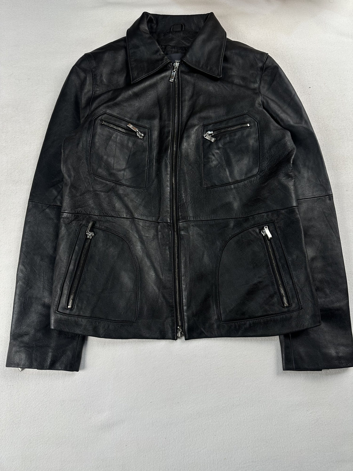 Black leather vintage jacket, size XS - chest and pocket detail.