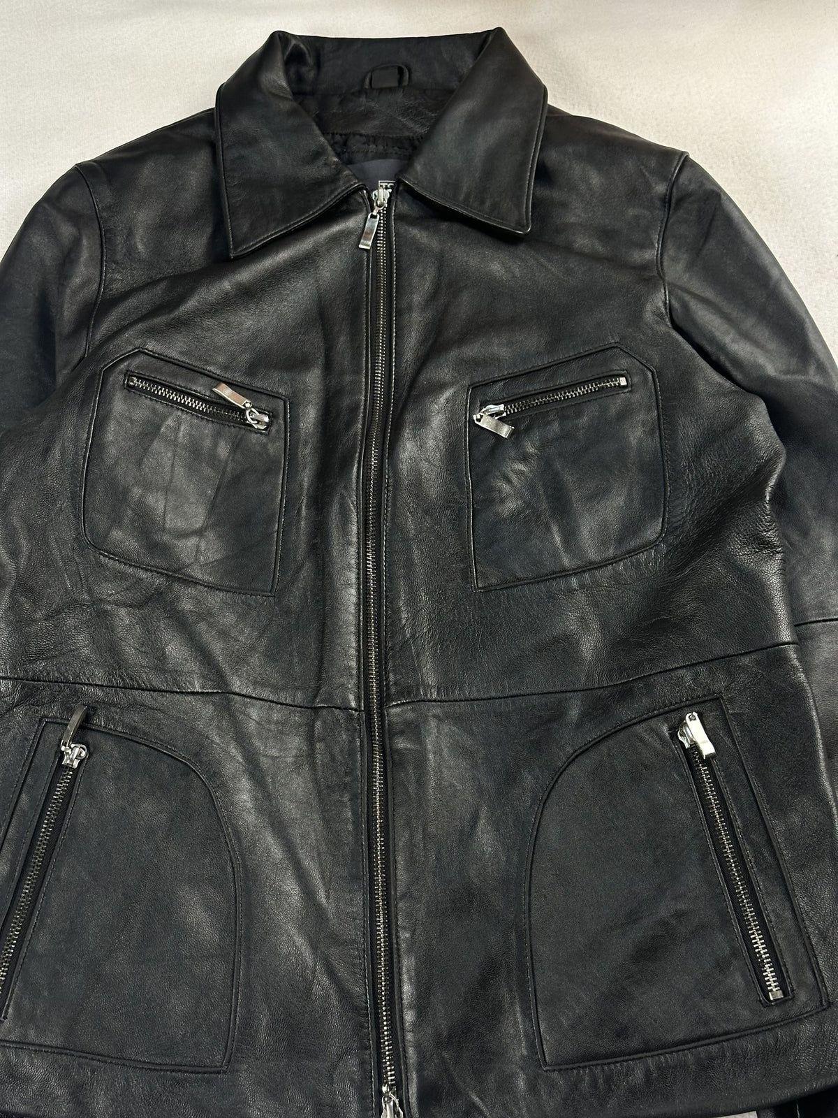 Black leather vintage jacket, size XS - back view.
