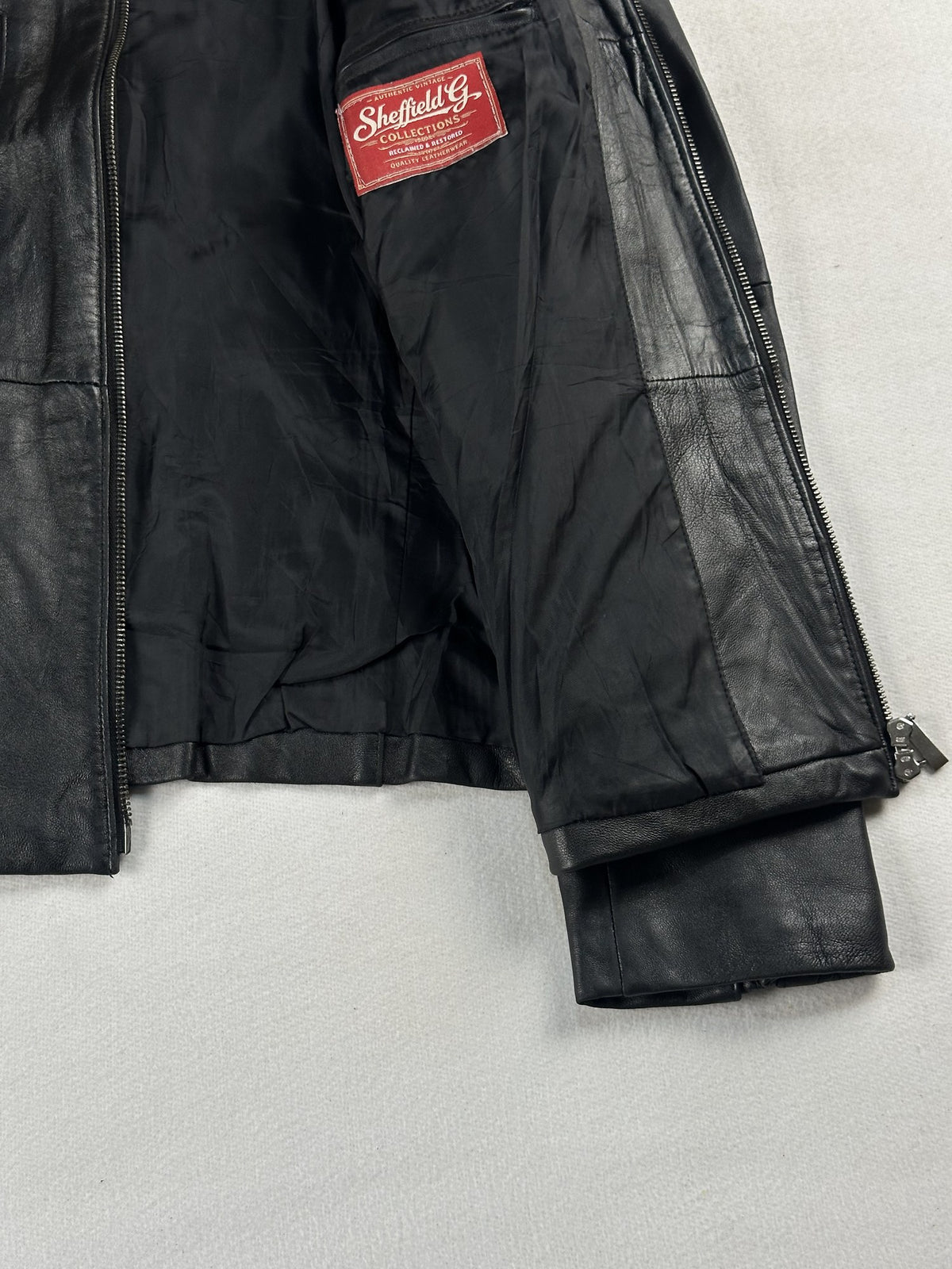 Black leather vintage jacket, size XS - interior lining.