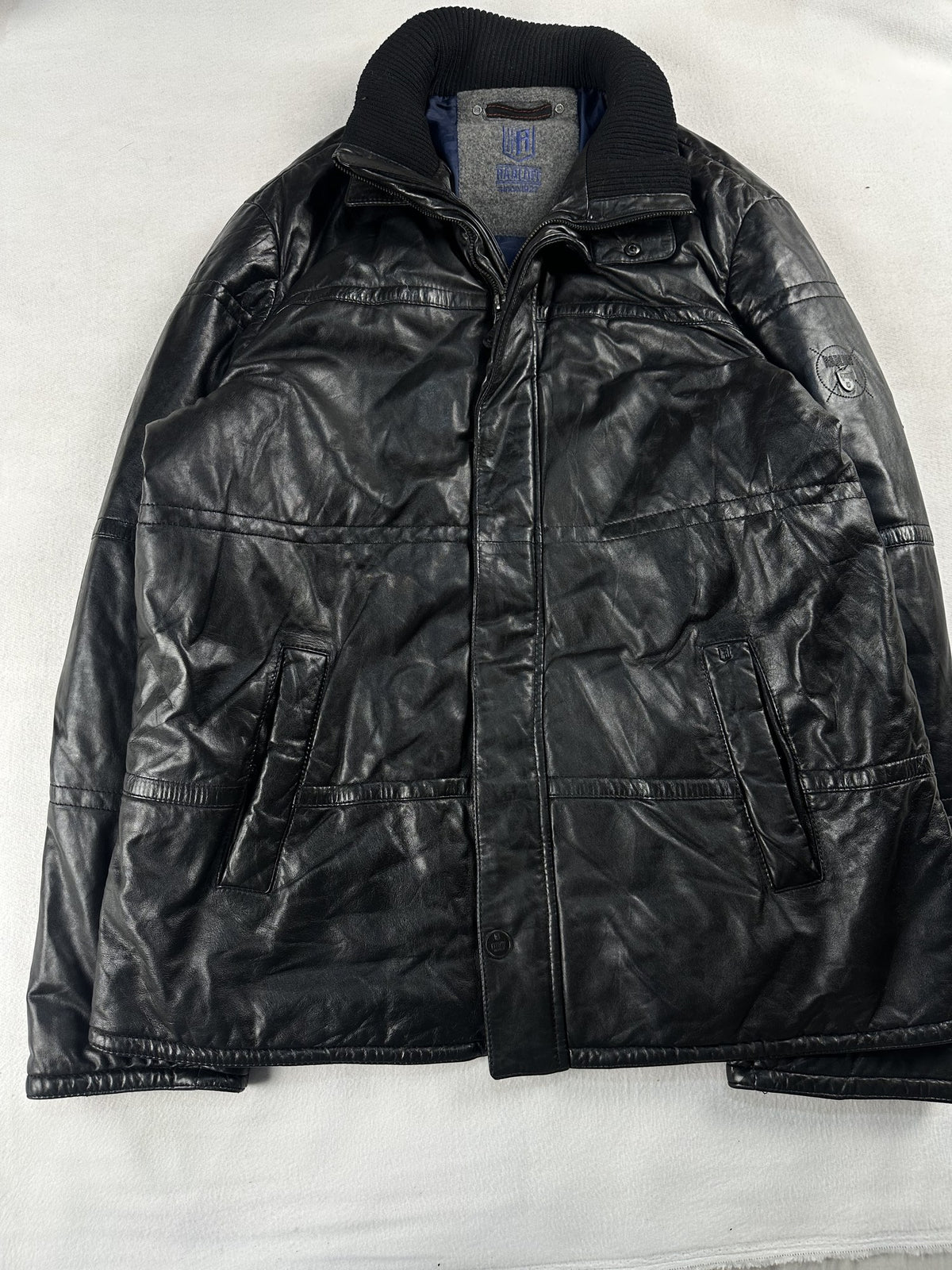 Black leather bomber jacket, size L - sleeve and cuff.