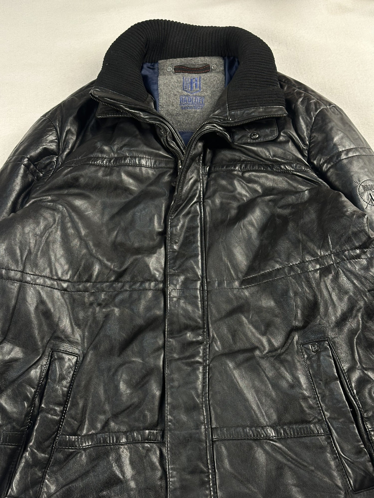 Black leather bomber jacket, size L - back view.