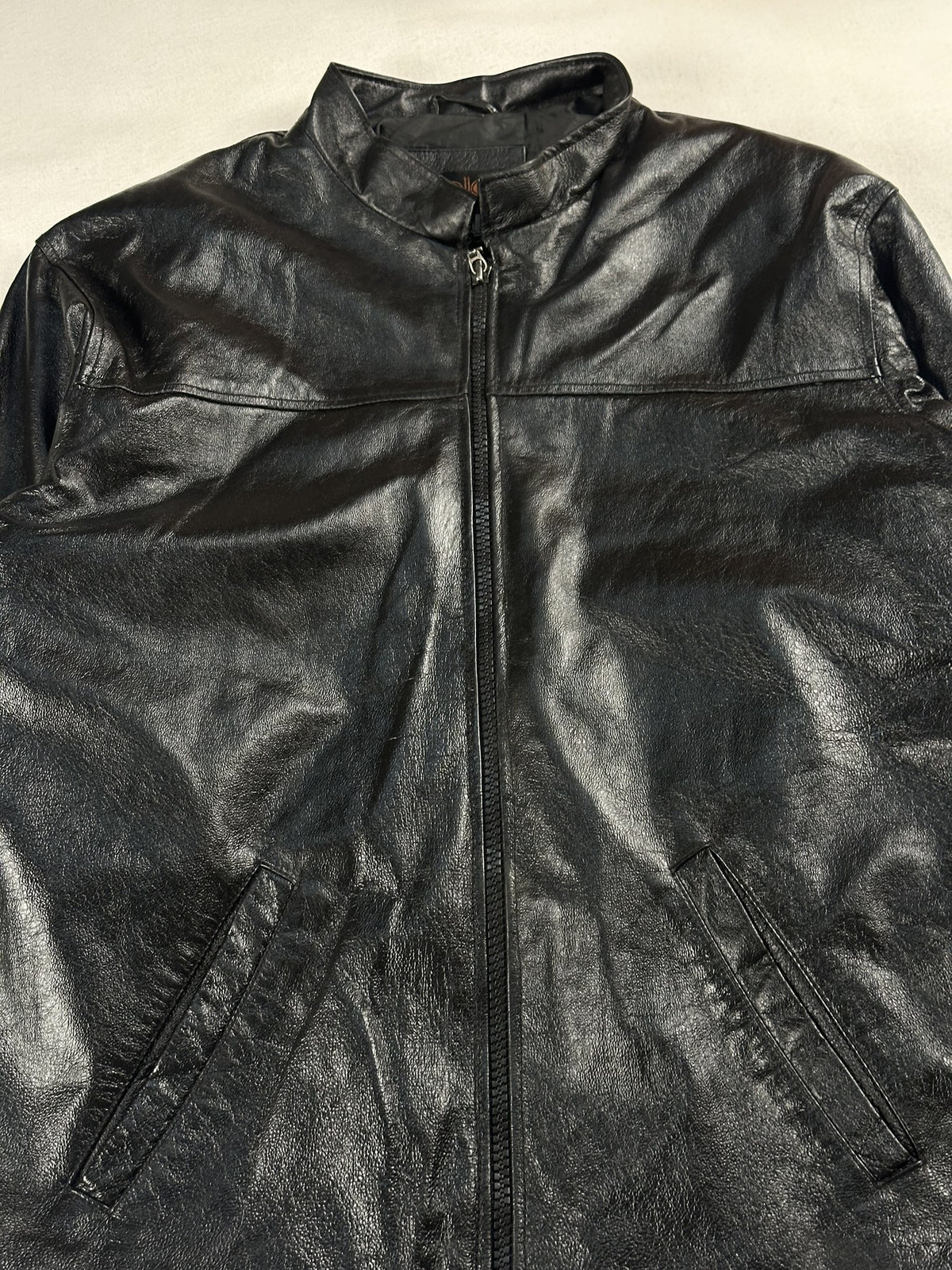 Black leather vintage jacket, size L - back view.