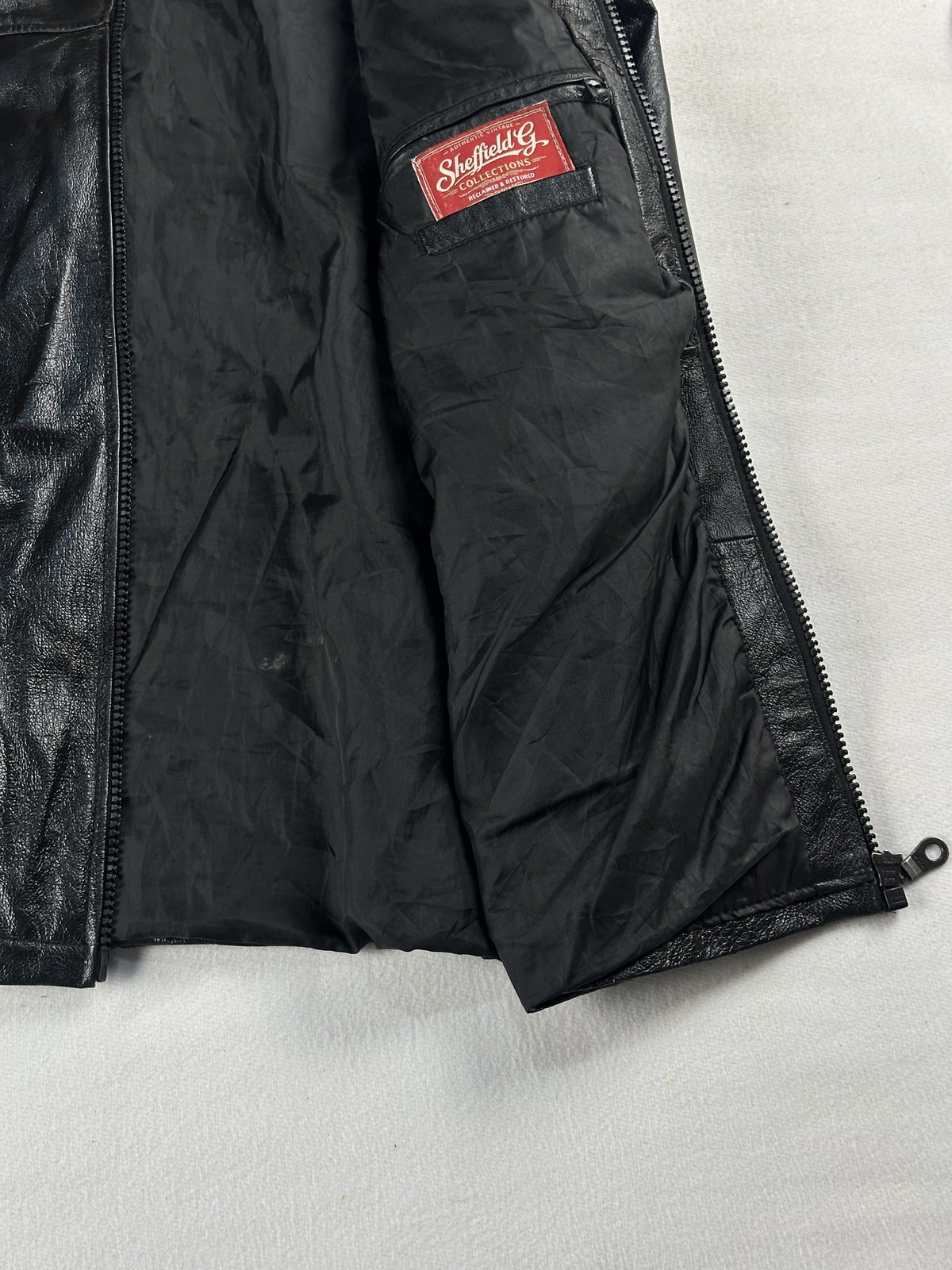 Black leather vintage jacket, size L - interior lining.